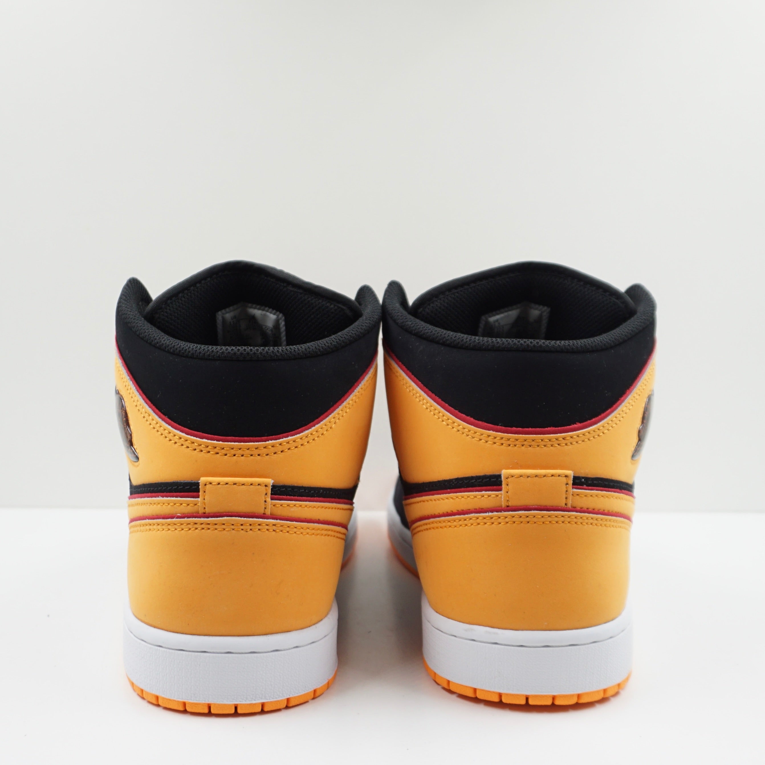 Jordan 1 Mid Fat Tongue Black Orange
