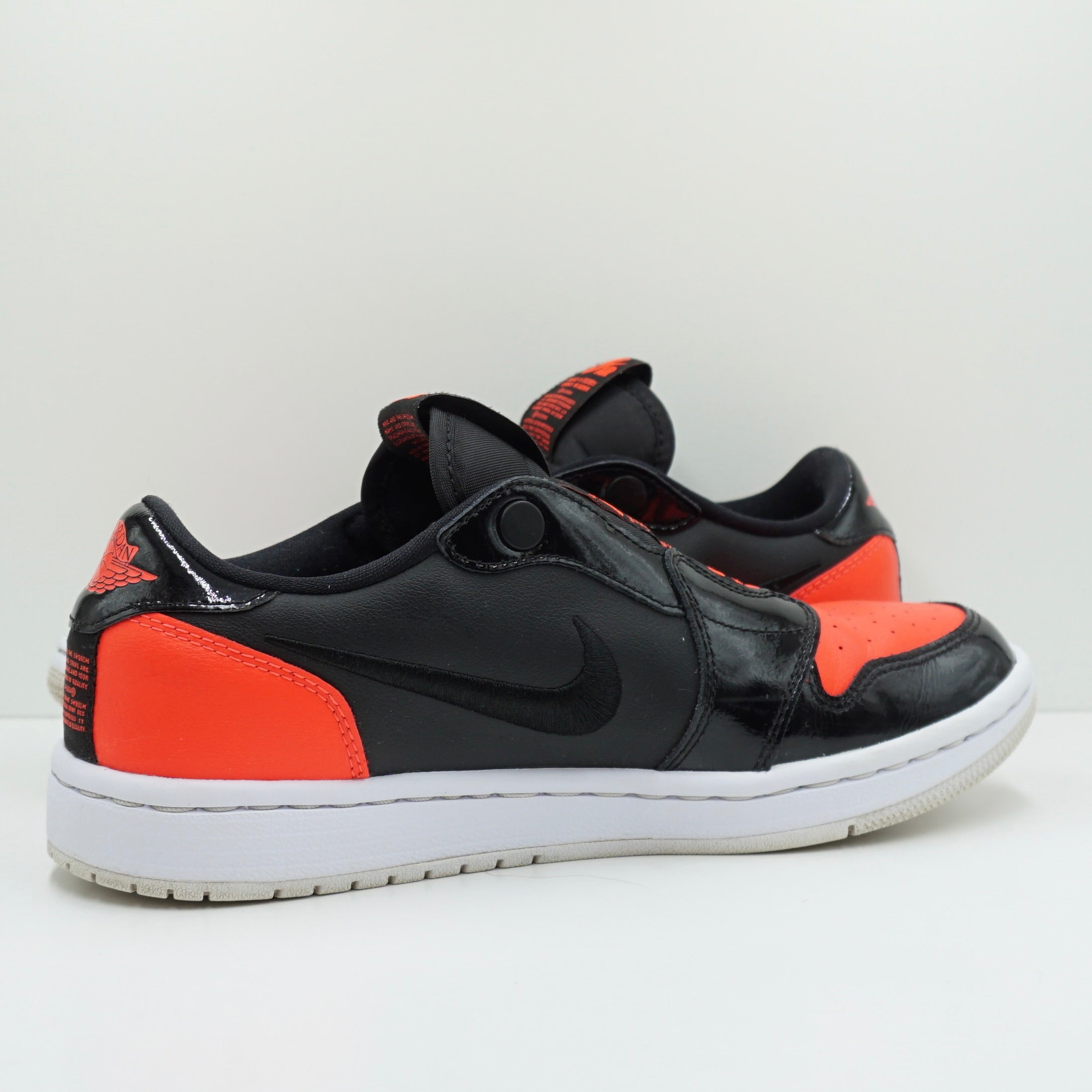 Jordan 1 Low Slip Black Hot Punch (W)