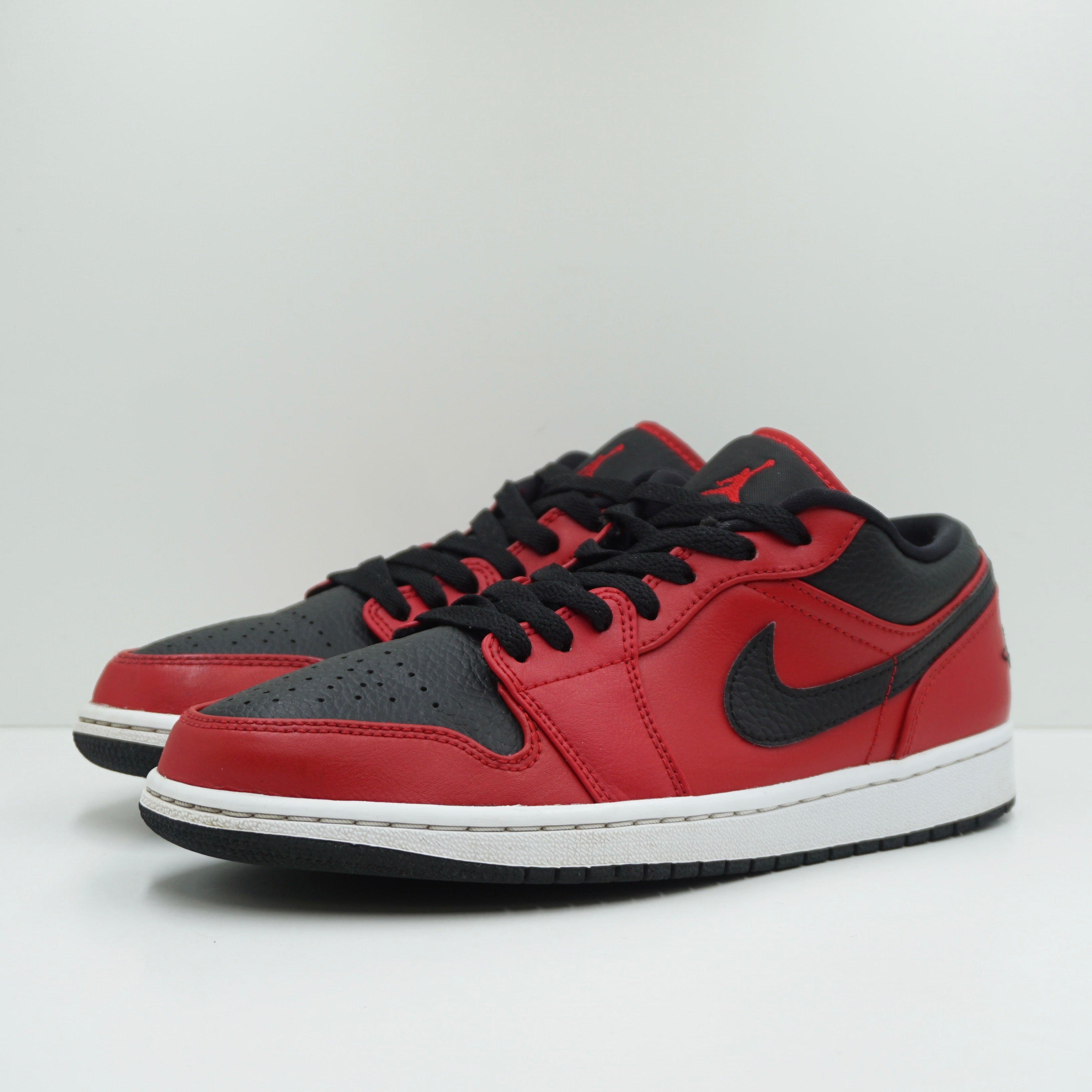 Jordan 1 Low Reverse Bred Pebbled Swoosh