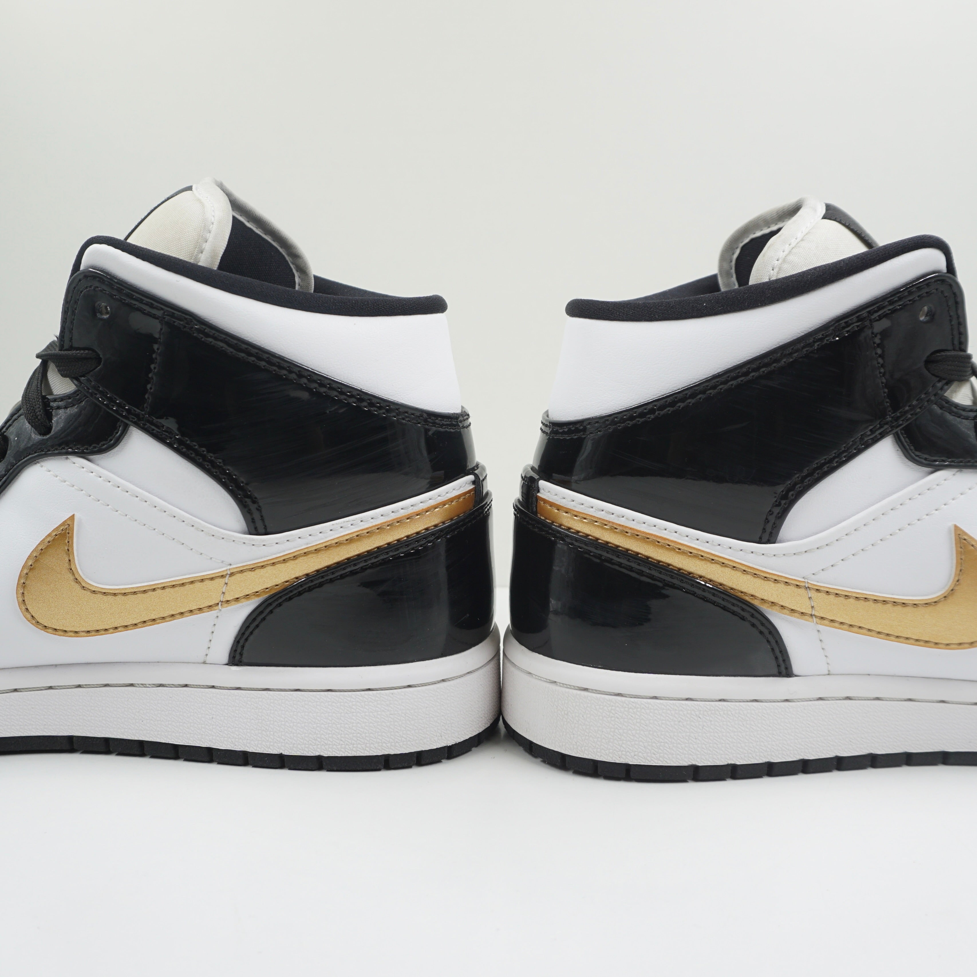 Jordan 1 Mid Patent Black White Gold