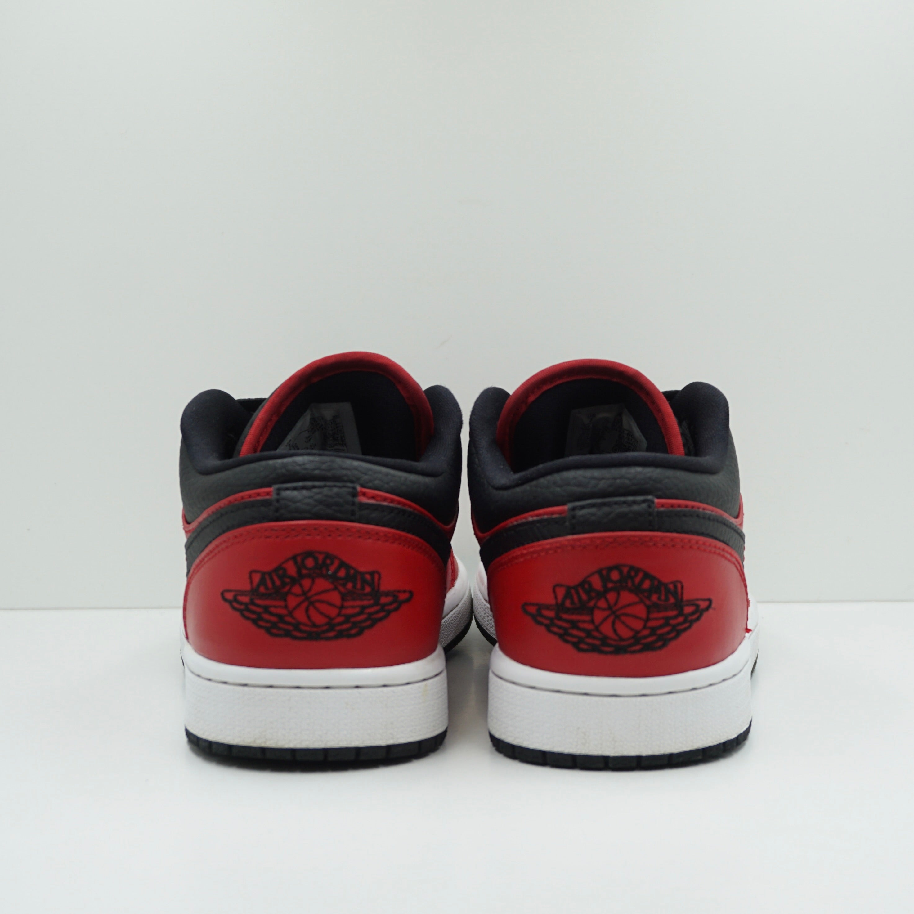 Jordan 1 Low Reverse Bred Pebbled Swoosh