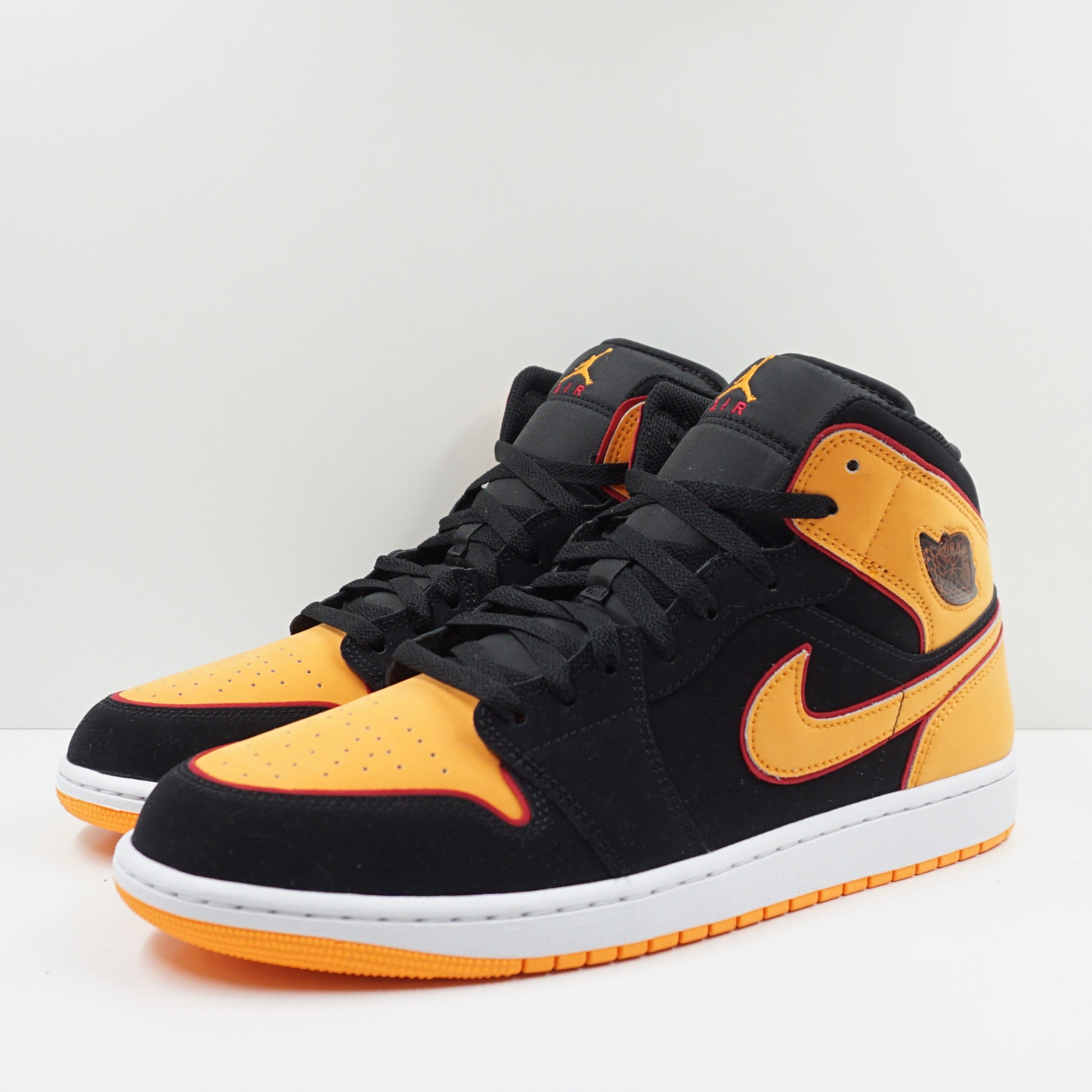 Jordan 1 Mid Fat Tongue Black Orange