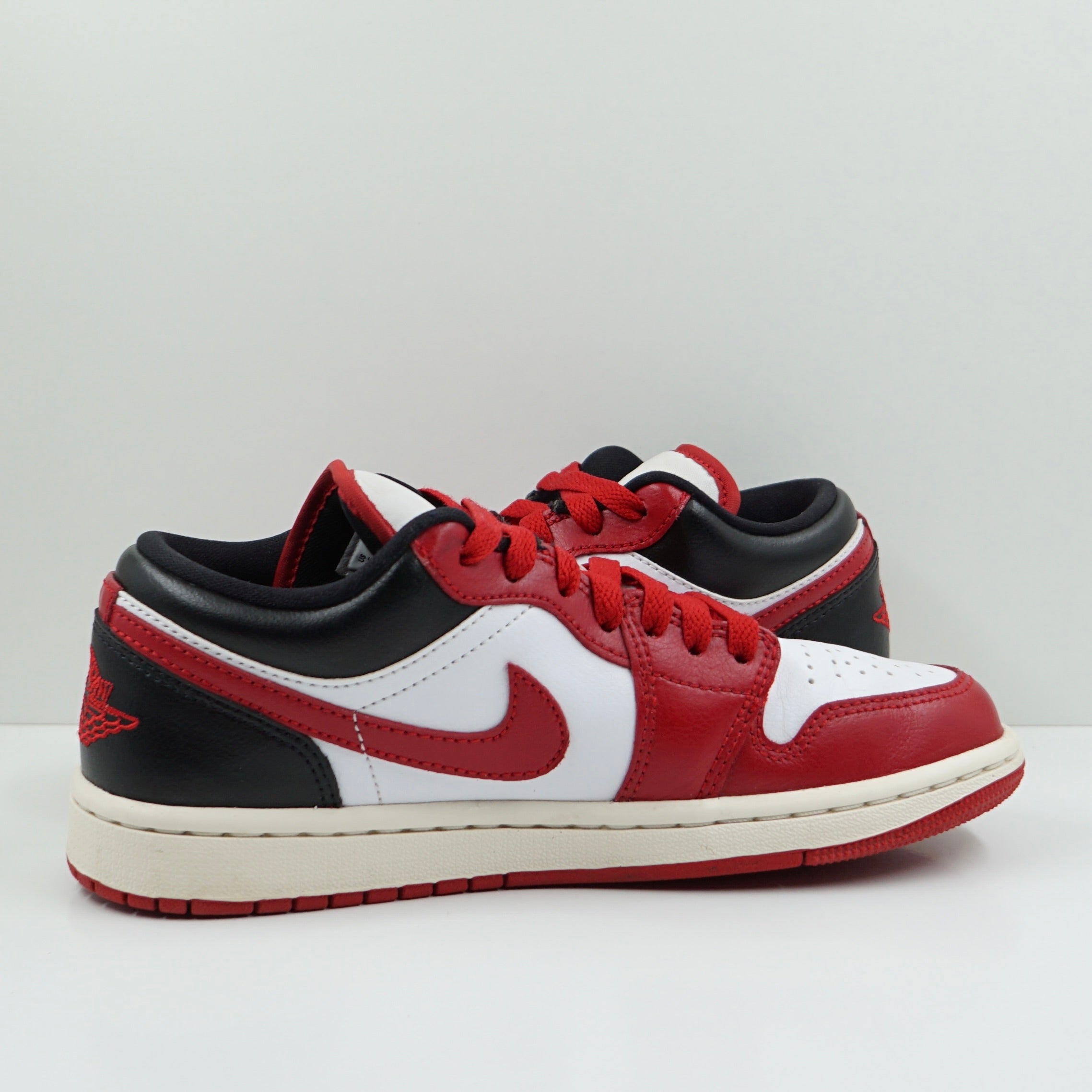 Jordan 1 Low Reverse Black Toe (W)
