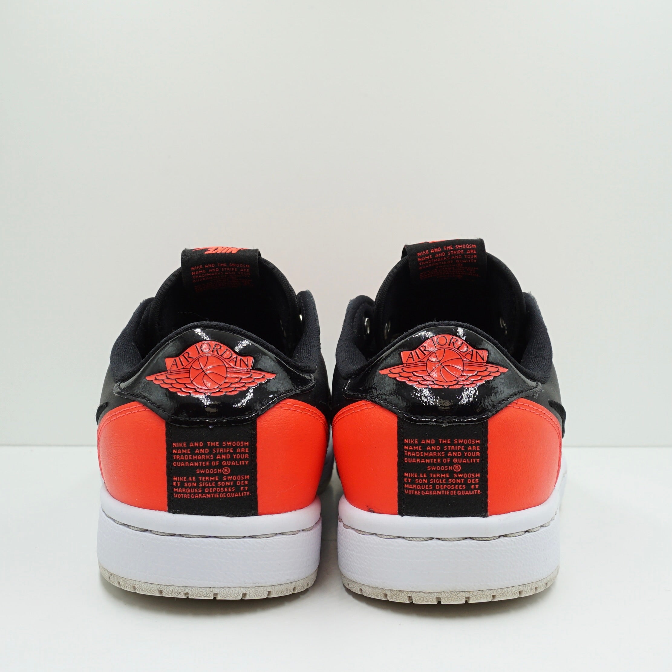 Jordan 1 Low Slip Black Hot Punch (W)