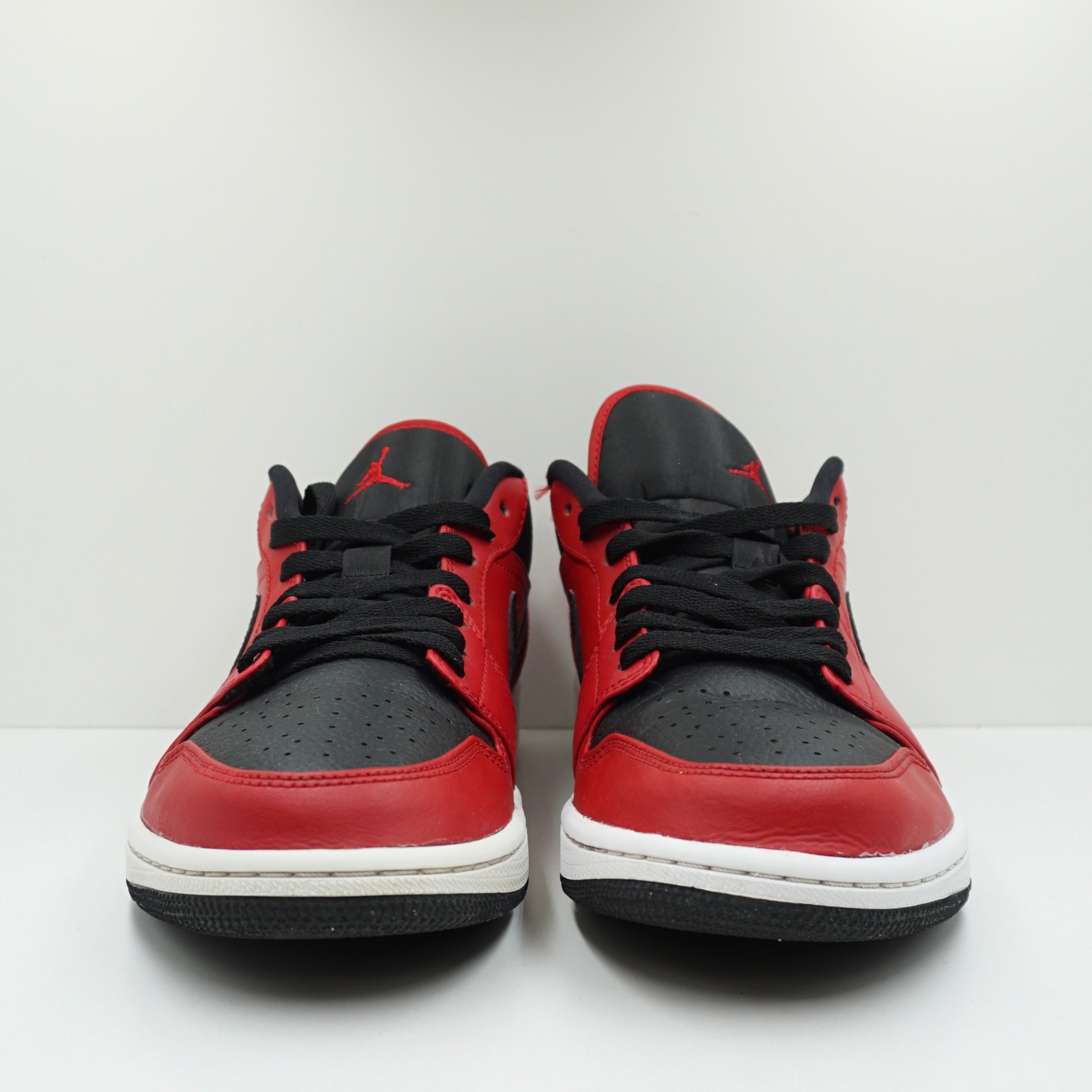 Jordan 1 Low Reverse Bred Pebbled Swoosh