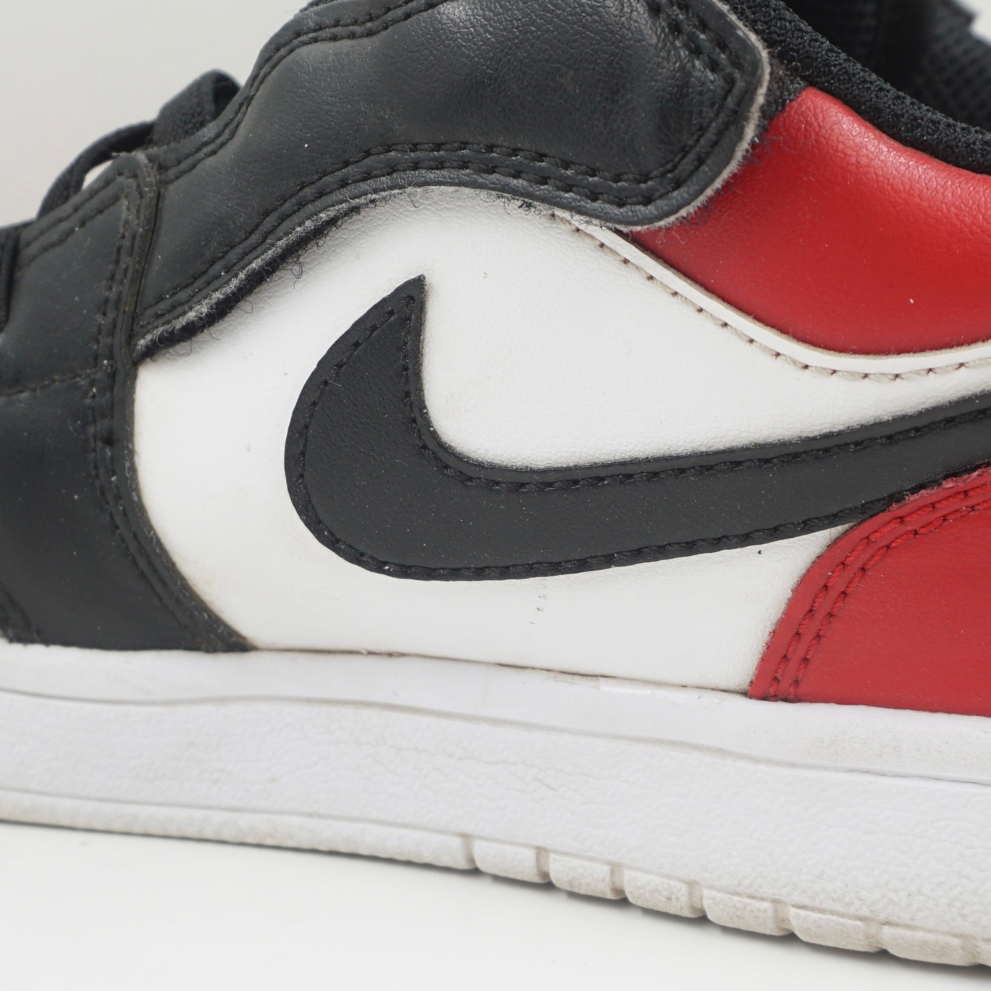 Jordan 1 Low ALT Bred Toe (PS)