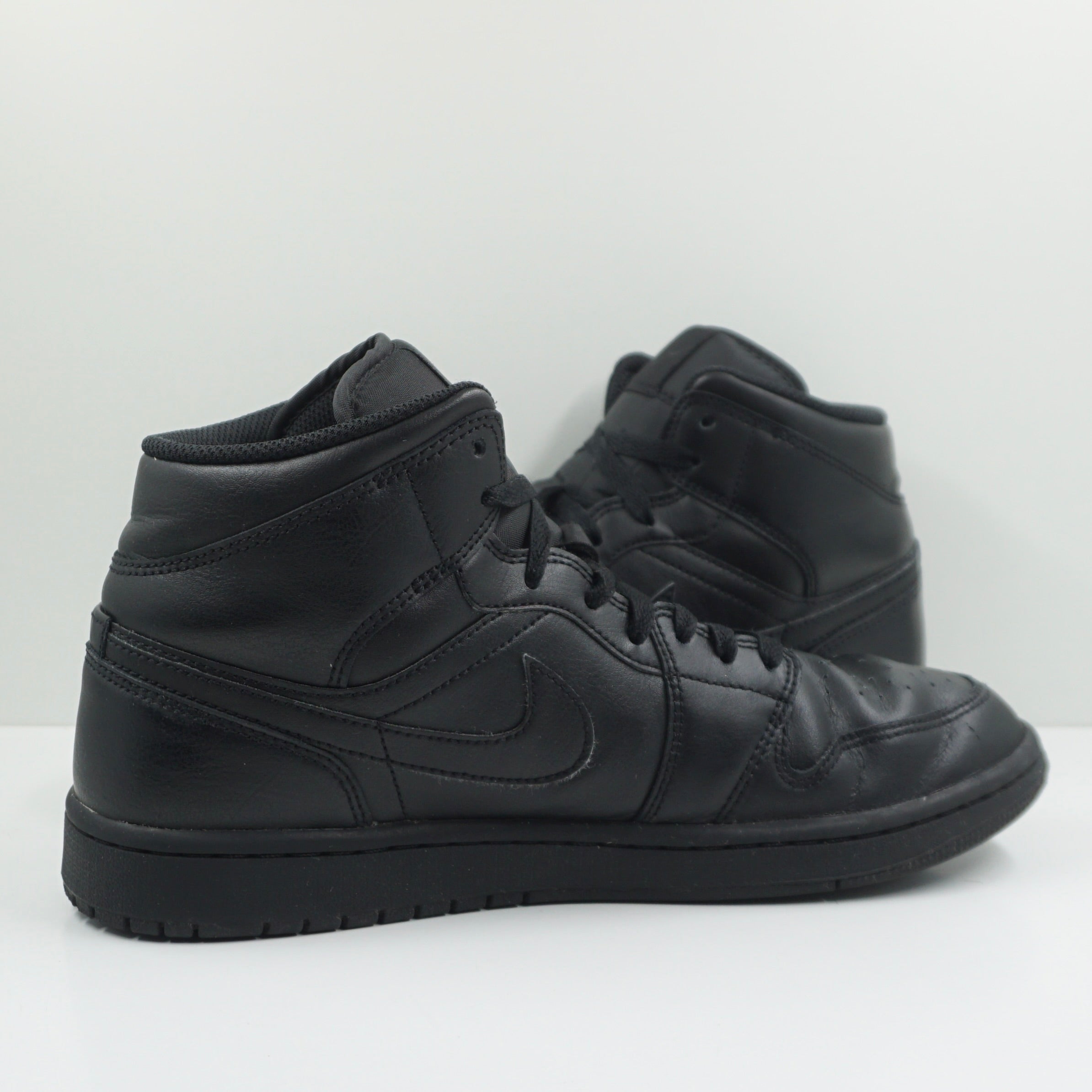 Jordan 1 Mid Triple Black