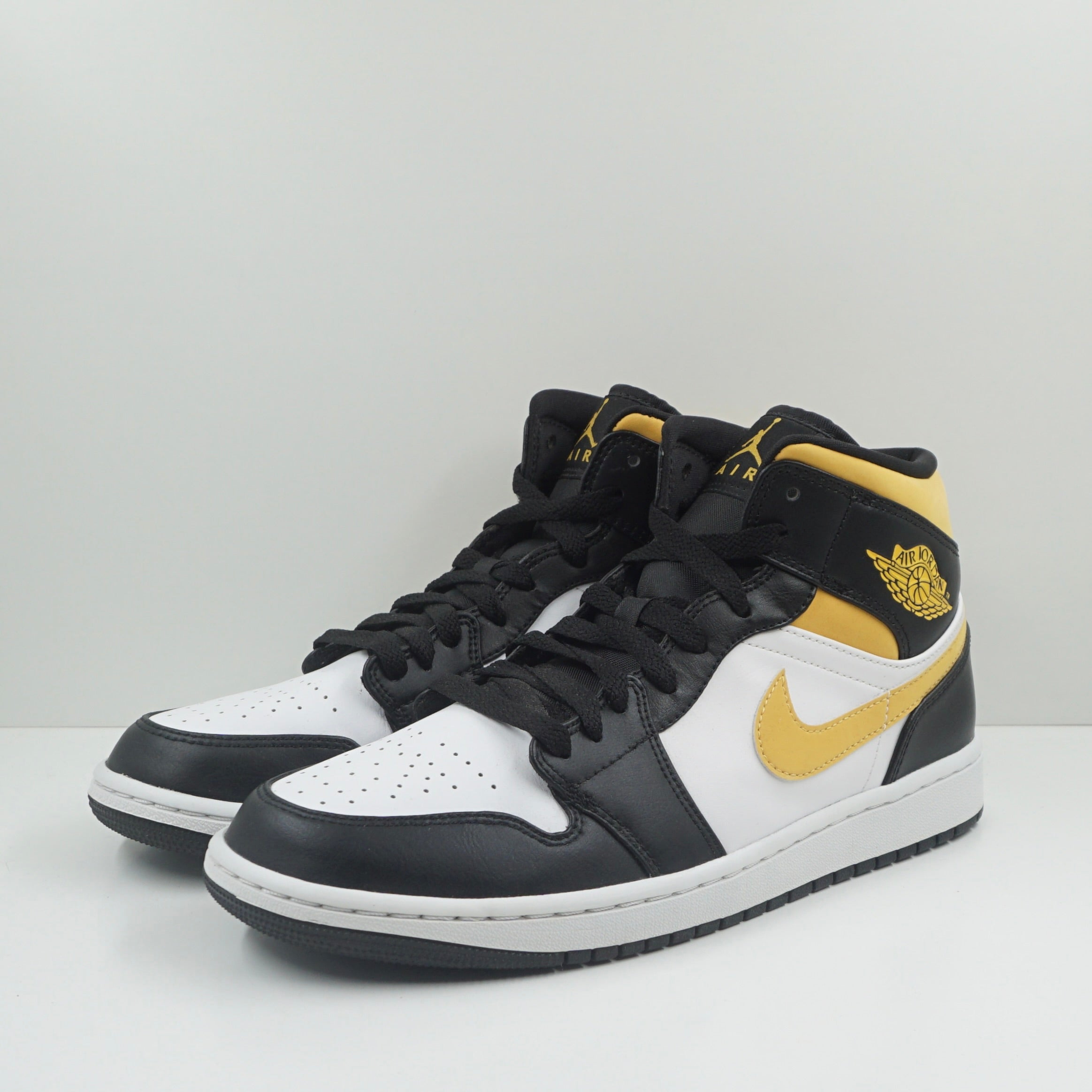 Jordan 1 Mid White Pollen Black
