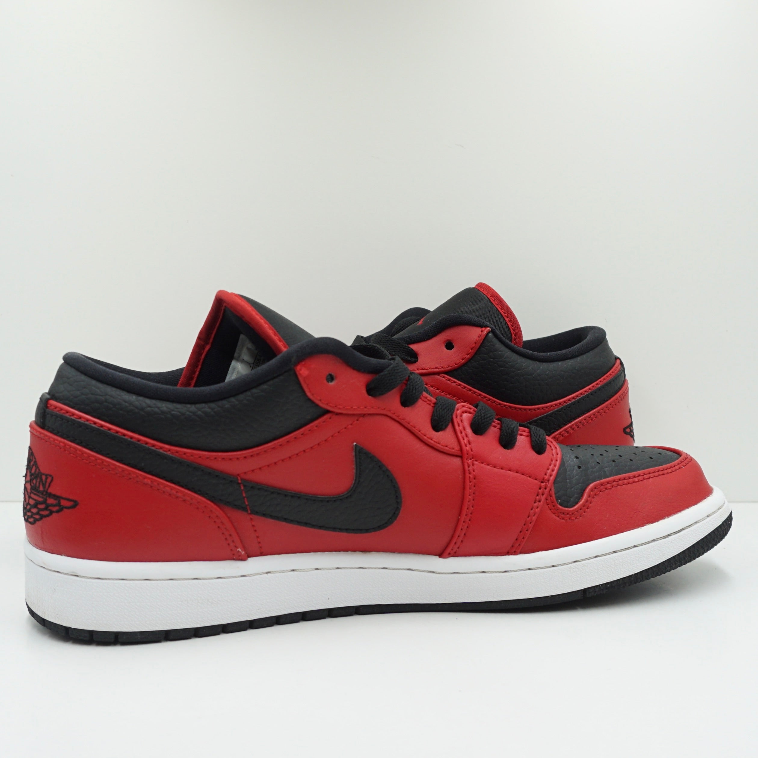 Jordan 1 Low Reverse Bred Pebbled Swoosh