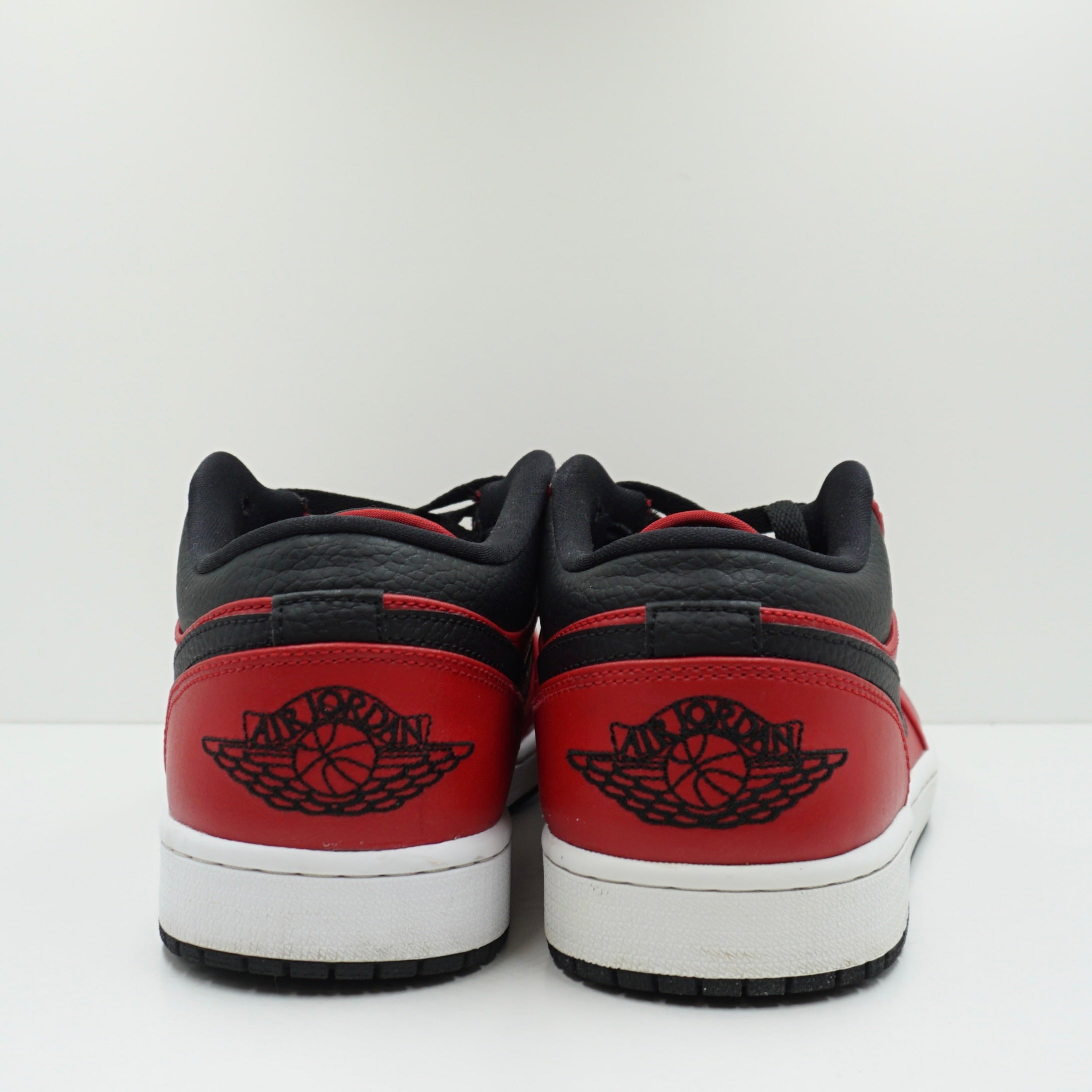 Jordan 1 Low Reverse Bred Pebbled Swoosh