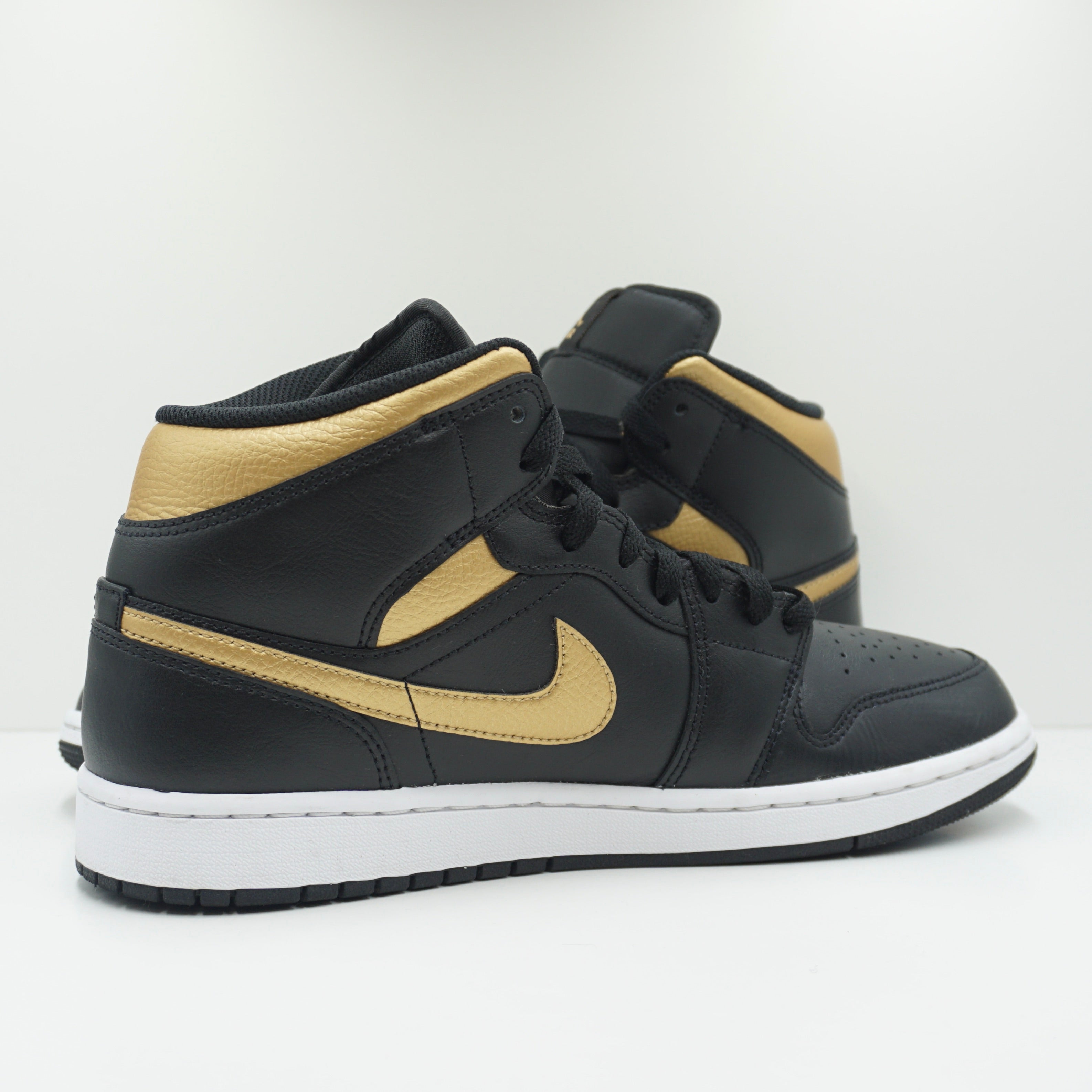 Jordan 1 Mid Black Metallic Gold