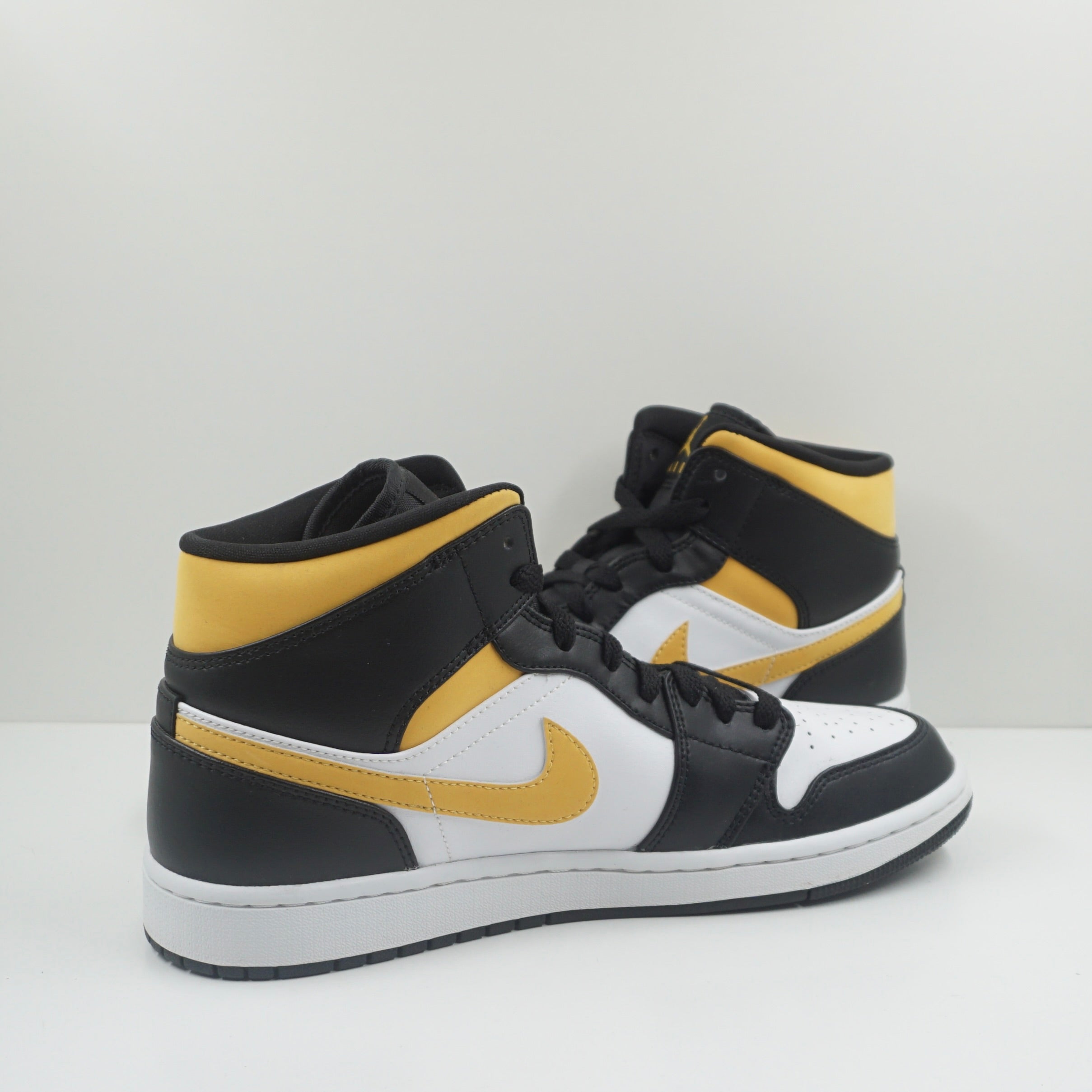 Jordan 1 Mid White Pollen Black
