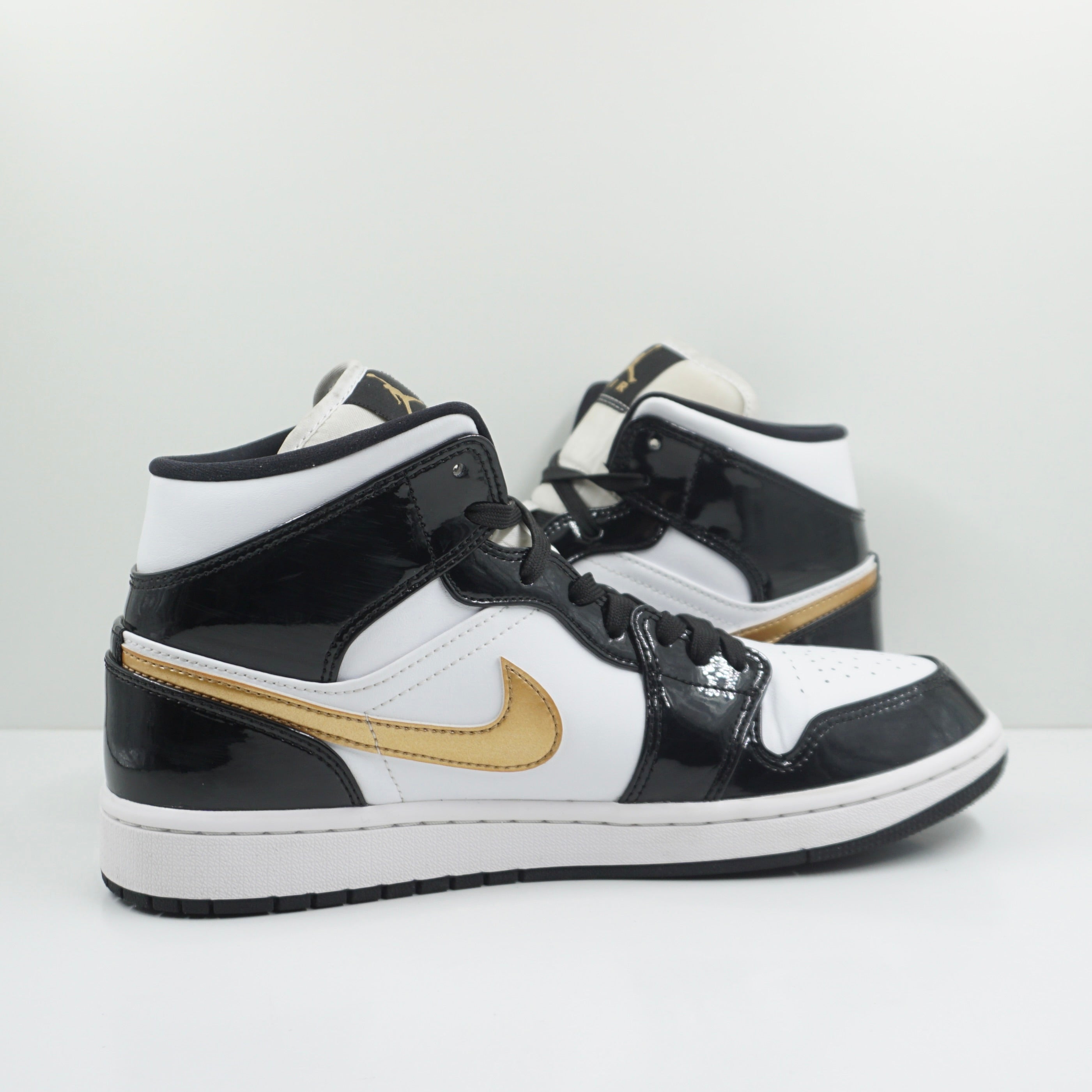 Jordan 1 Mid Patent Black White Gold