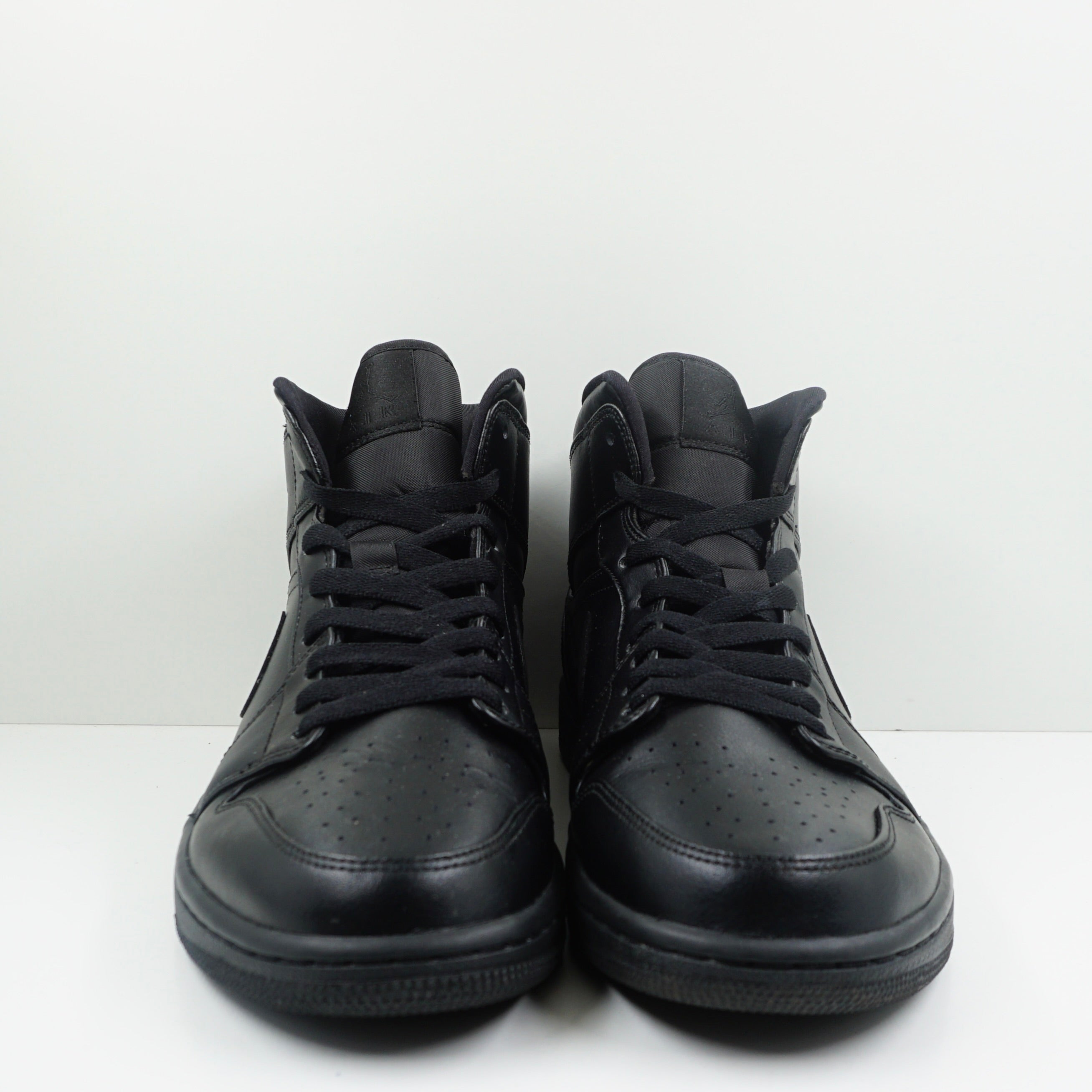Jordan 1 Mid Black