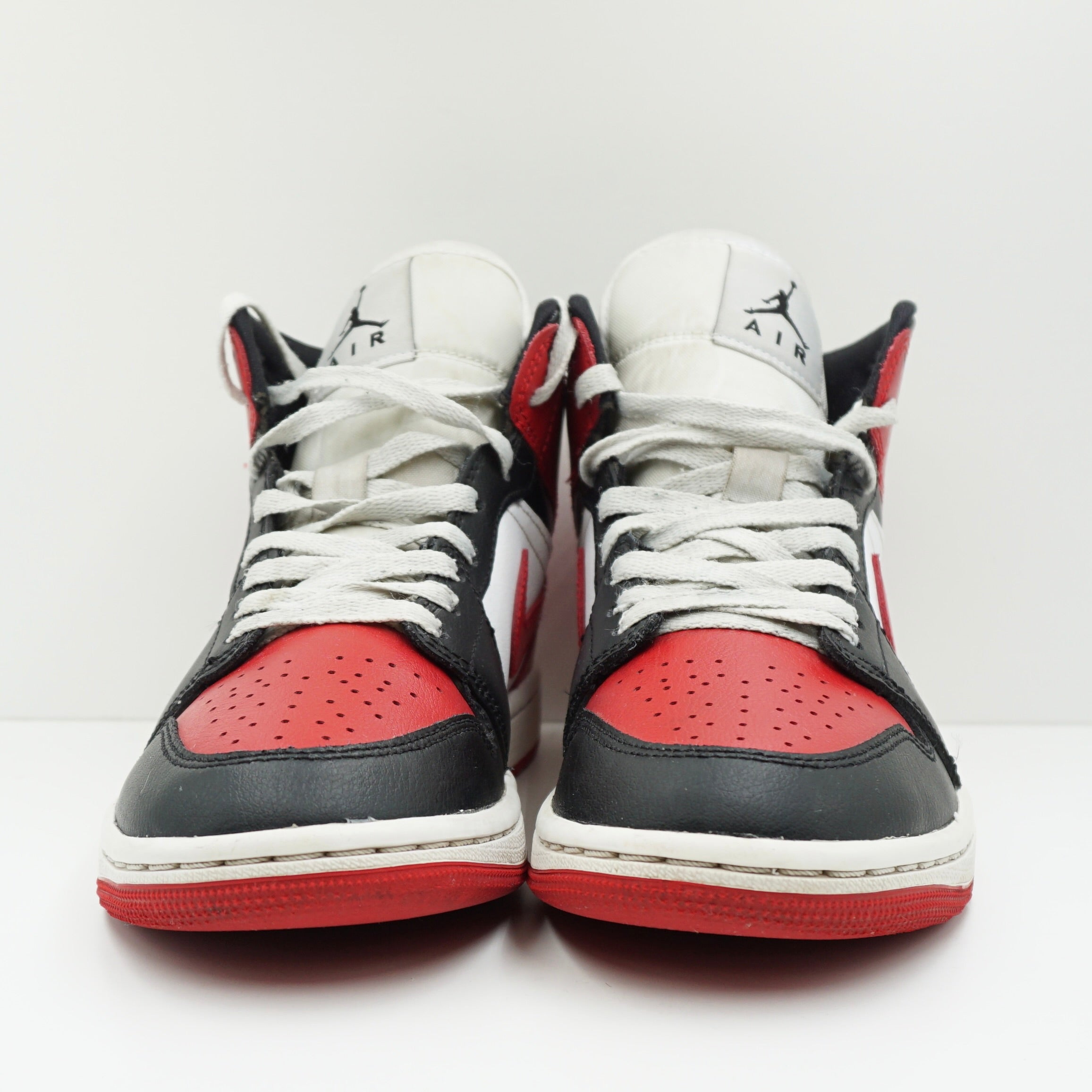 Jordan 1 Mid Alternate Bred Toe (W)