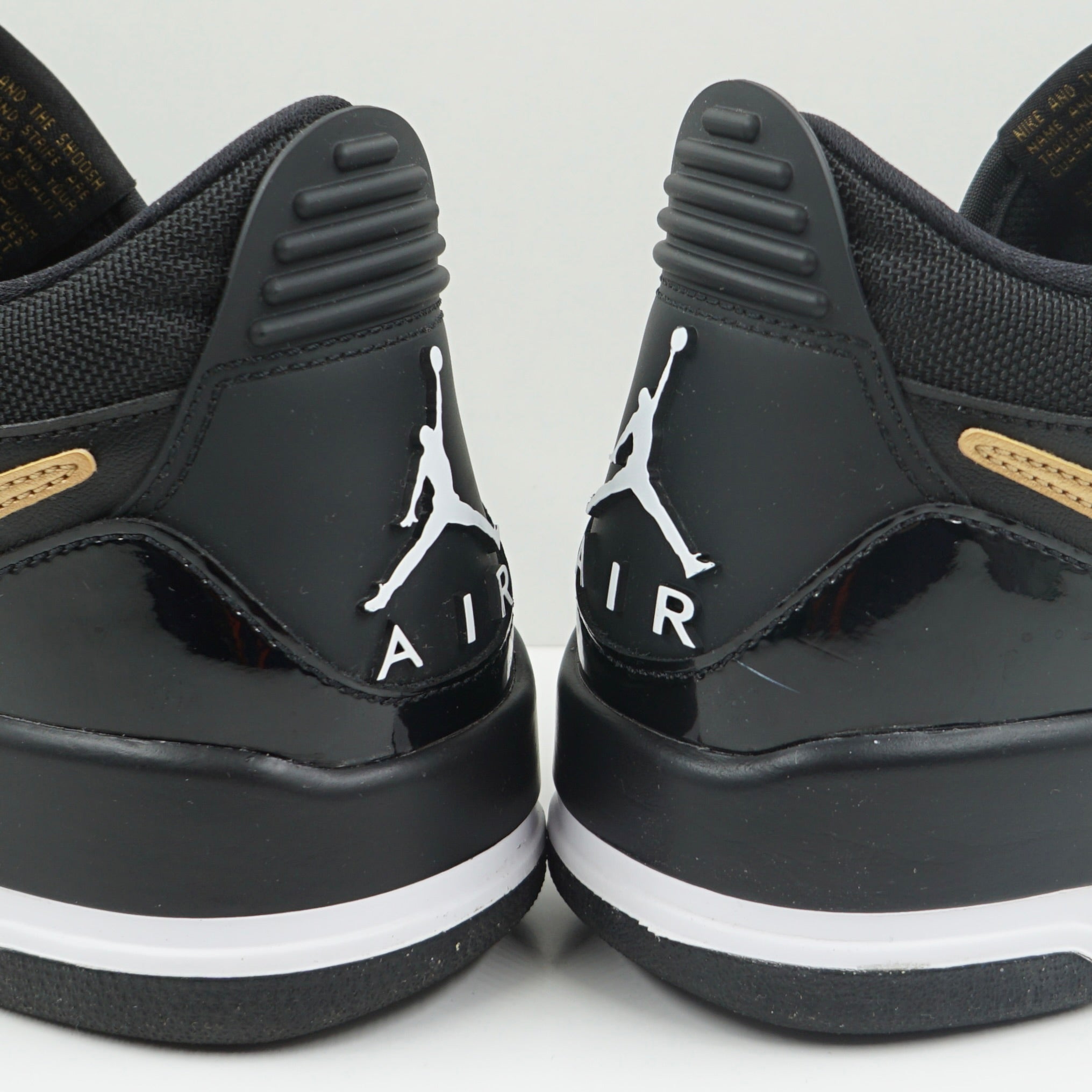 Jordan Legacy 312 Low Black Metallic Gold