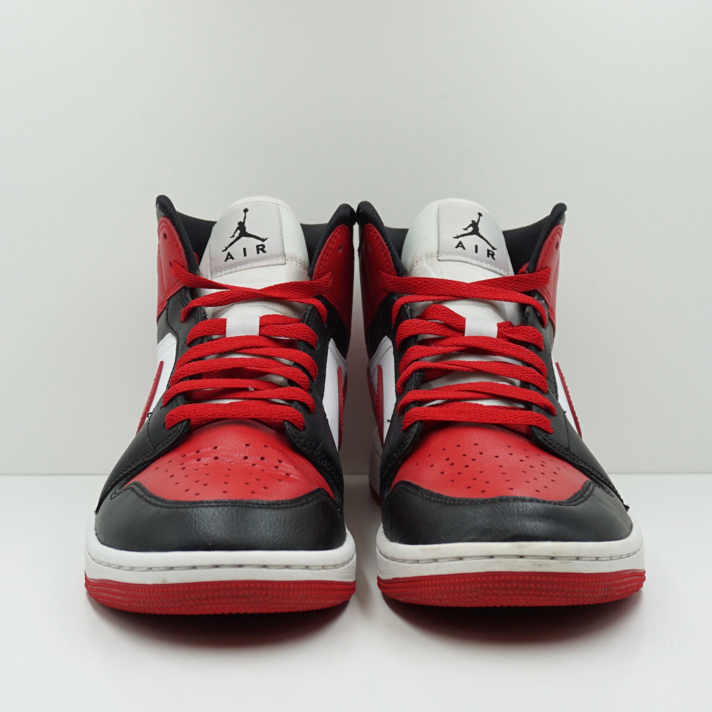 Jordan 1 Mid Alternate Bred Toe (W)