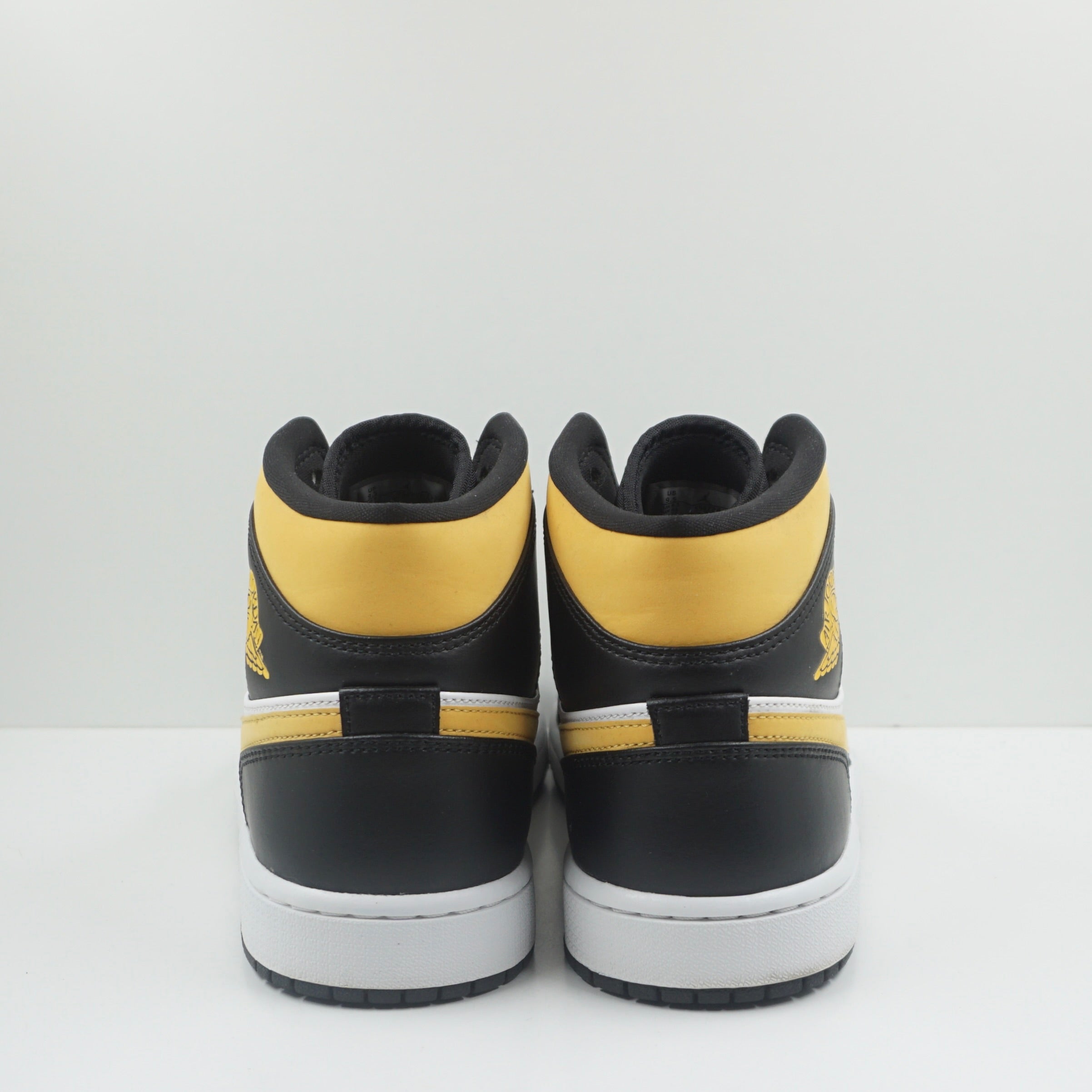 Jordan 1 Mid White Pollen Black