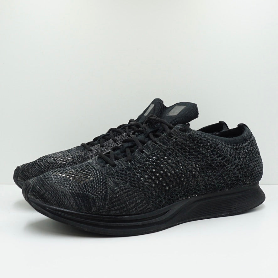 Nike flyknit racer triple black australia hotsell