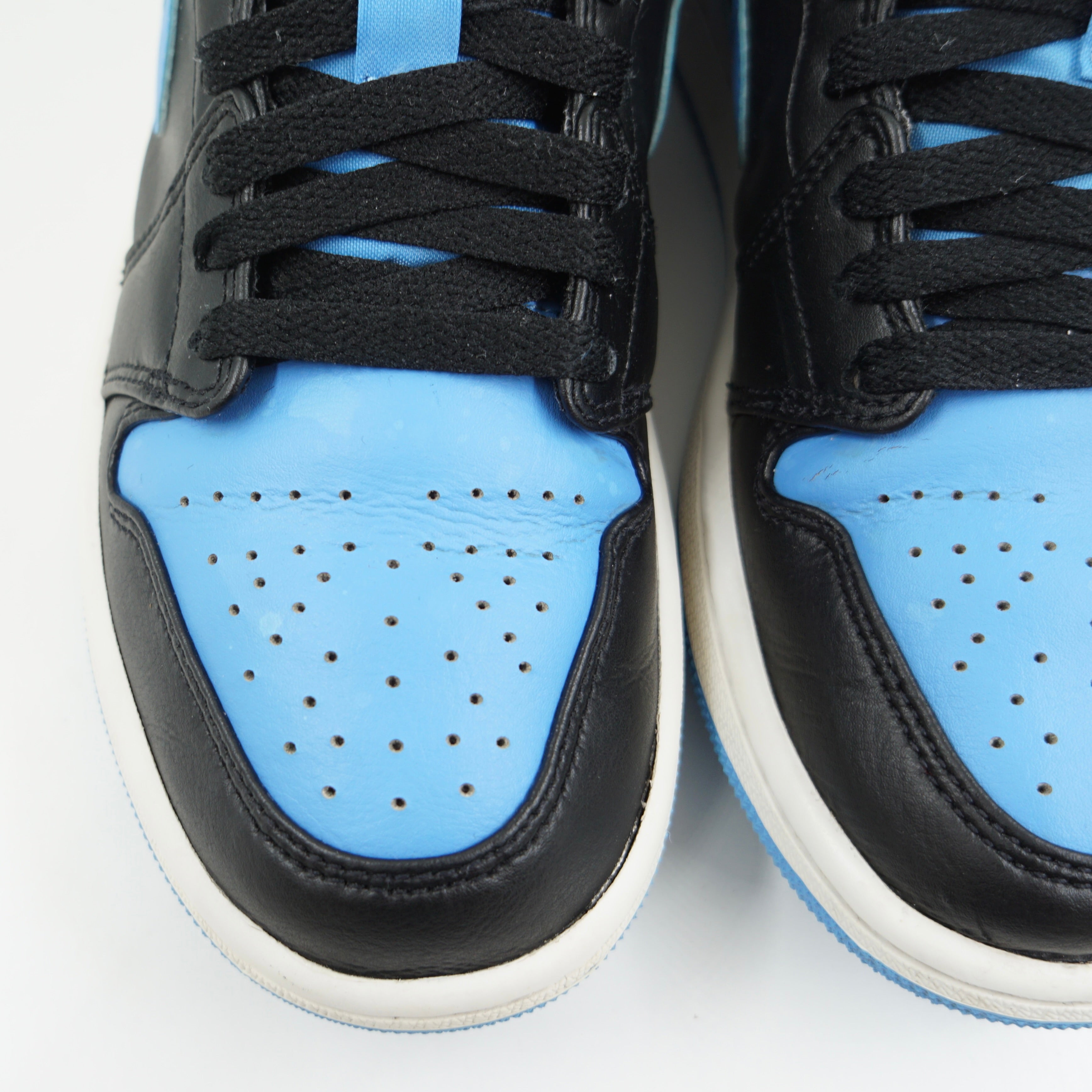 Jordan 1 Low Black University Blue