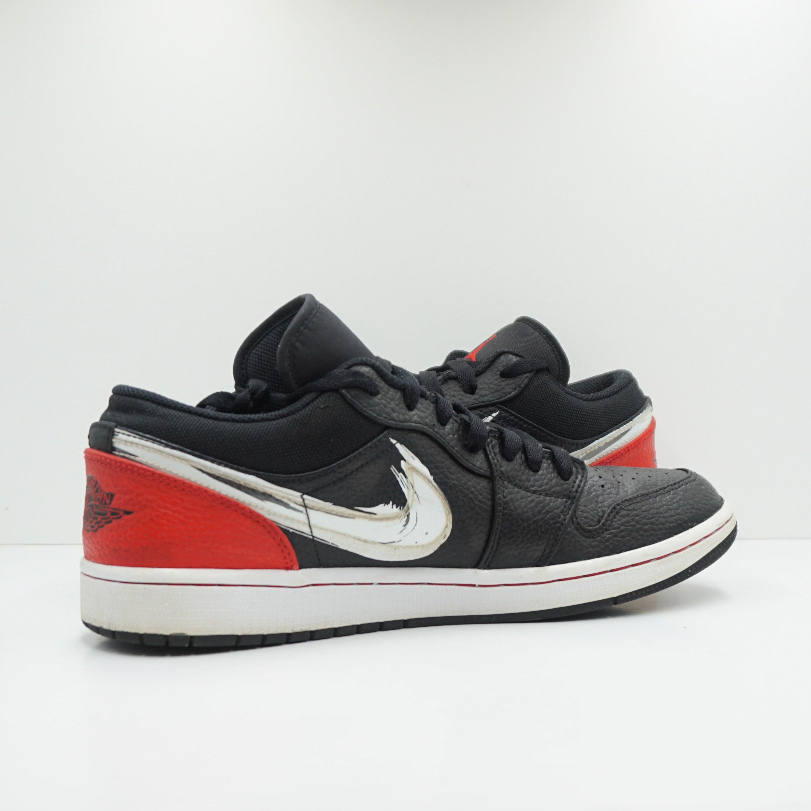 Jordan 1 Low Brushstroke Swoosh Black