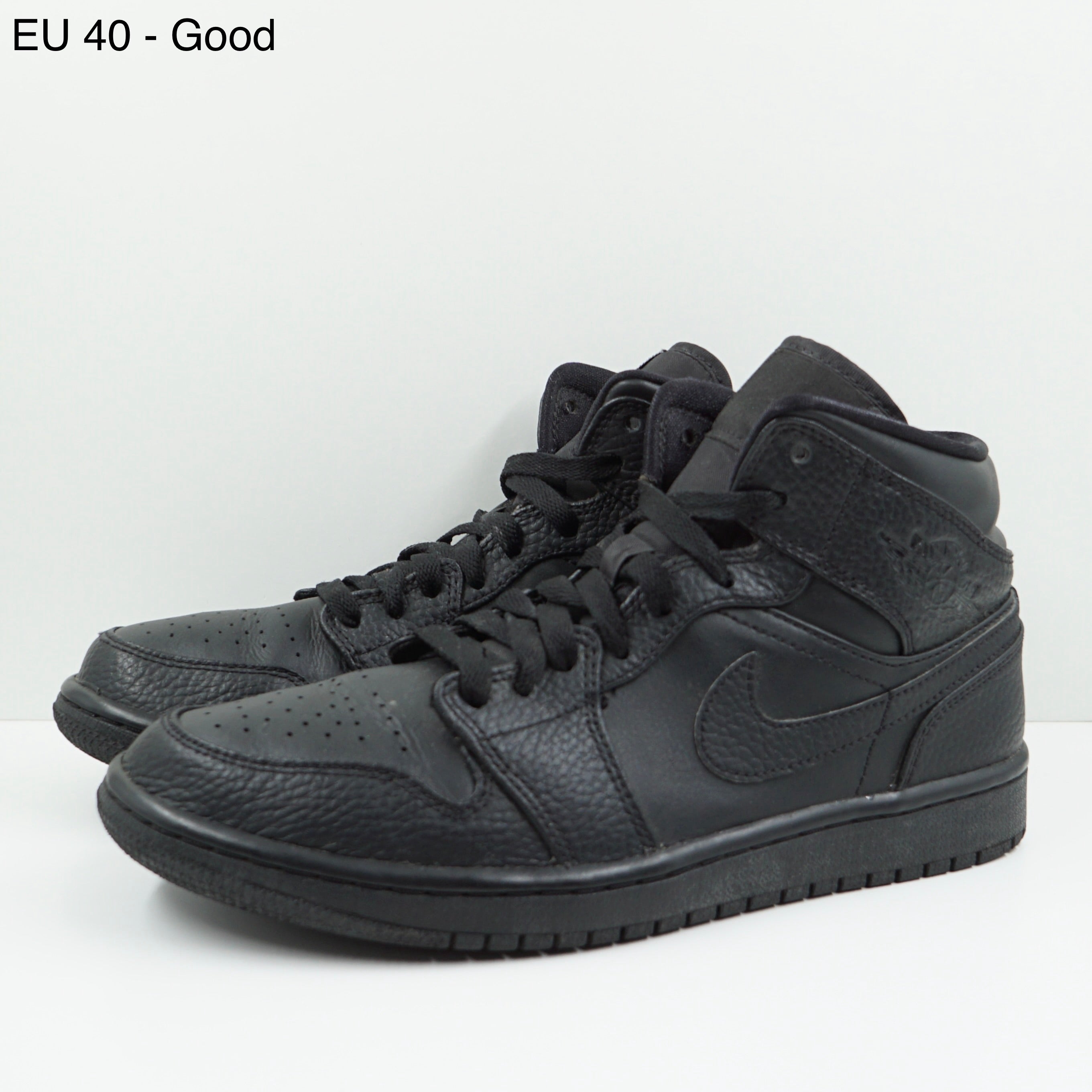 Jordan 1 Mid Triple Black