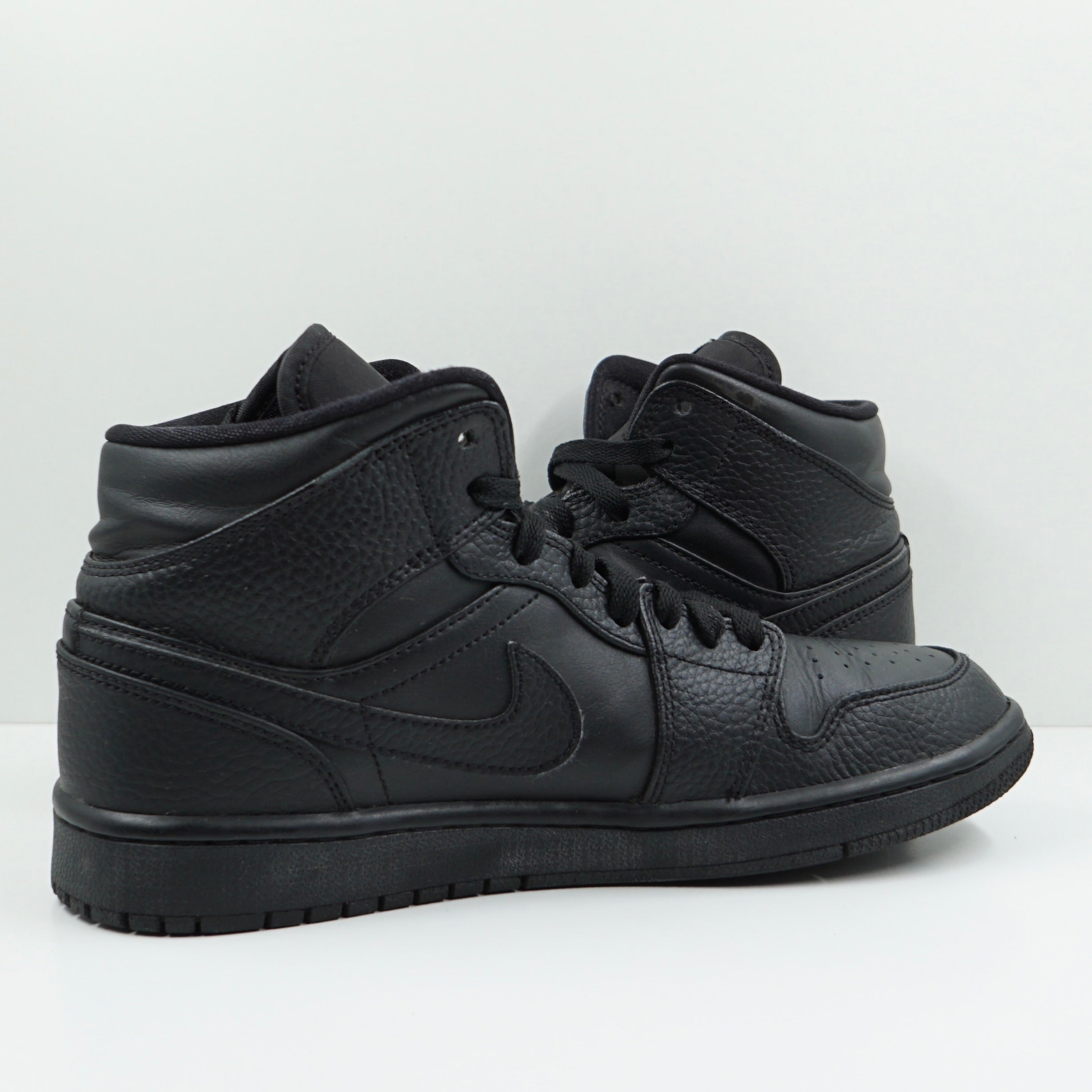 Jordan 1 Mid Triple Black