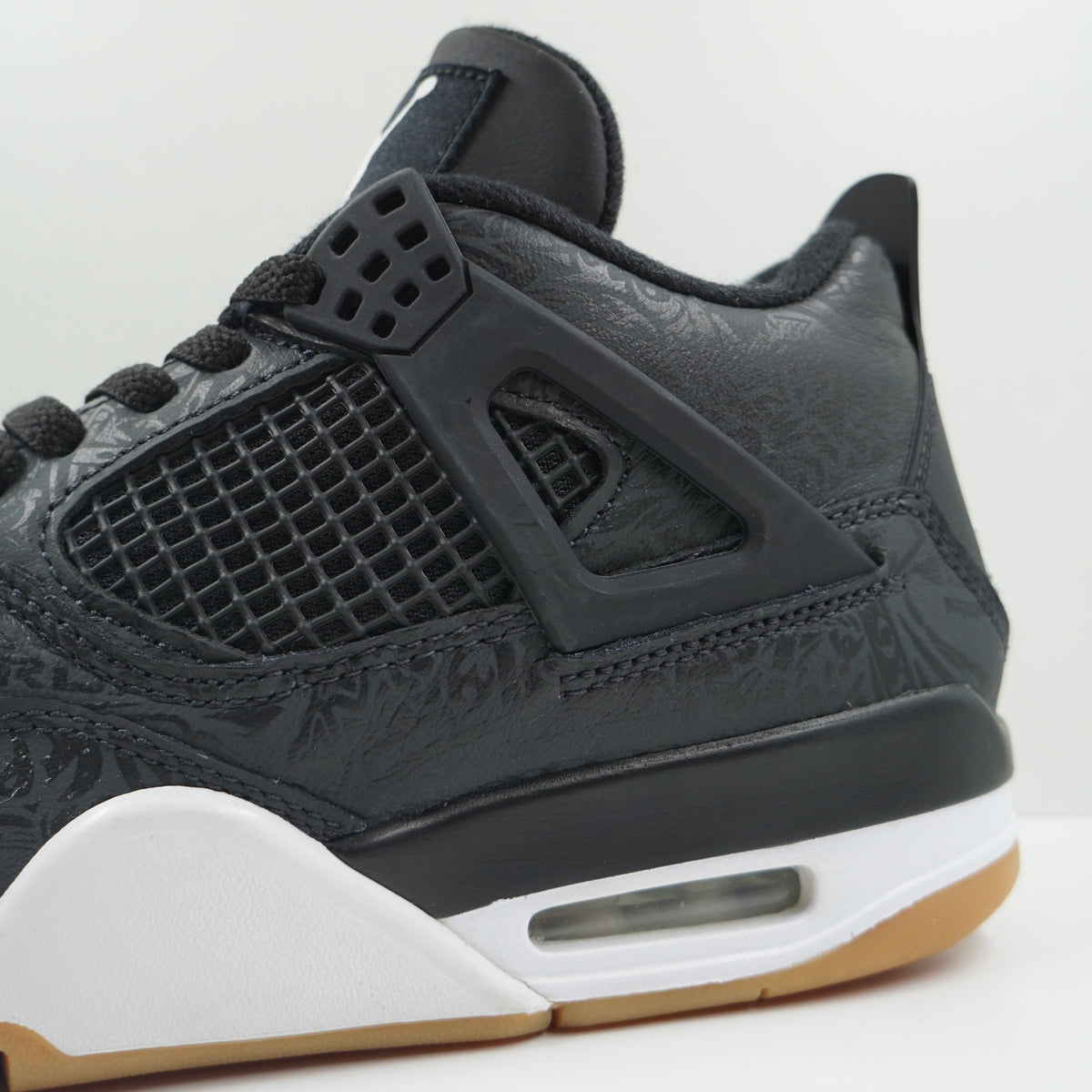 Jordan 4 Retro Laser Black Gum