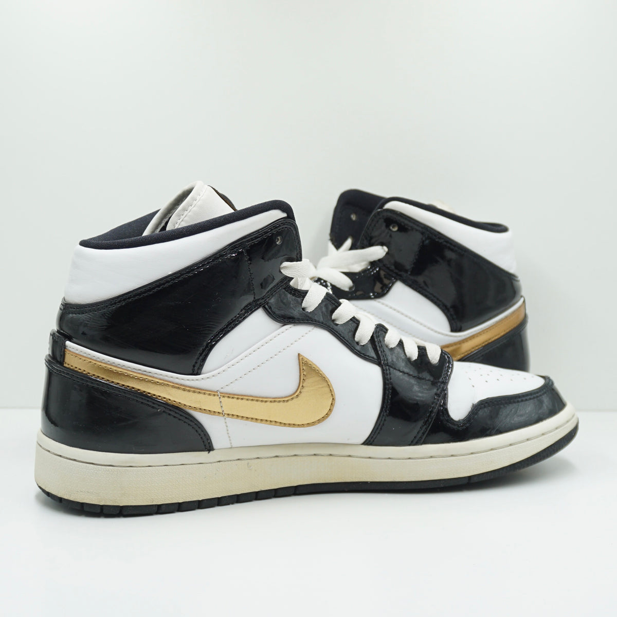 Jordan 1 Mid Patent Black White Gold