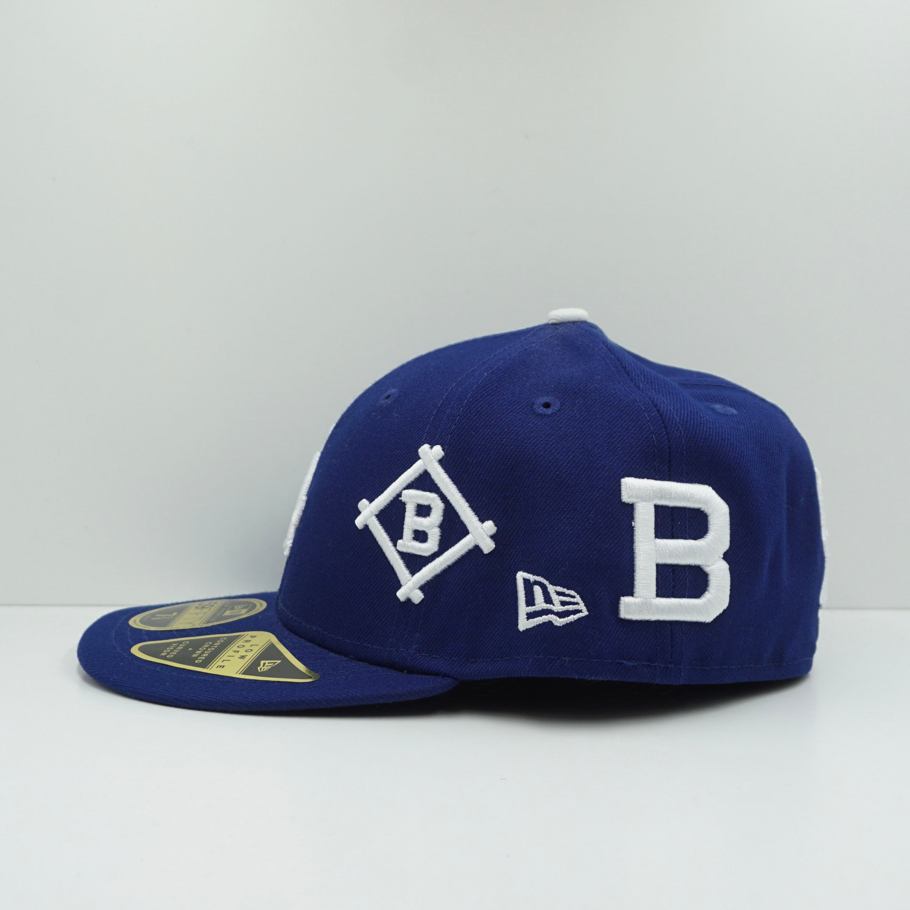 New Era Los Angeles Dodgers All Over Logo Dark Royal Blue Fitted Cap