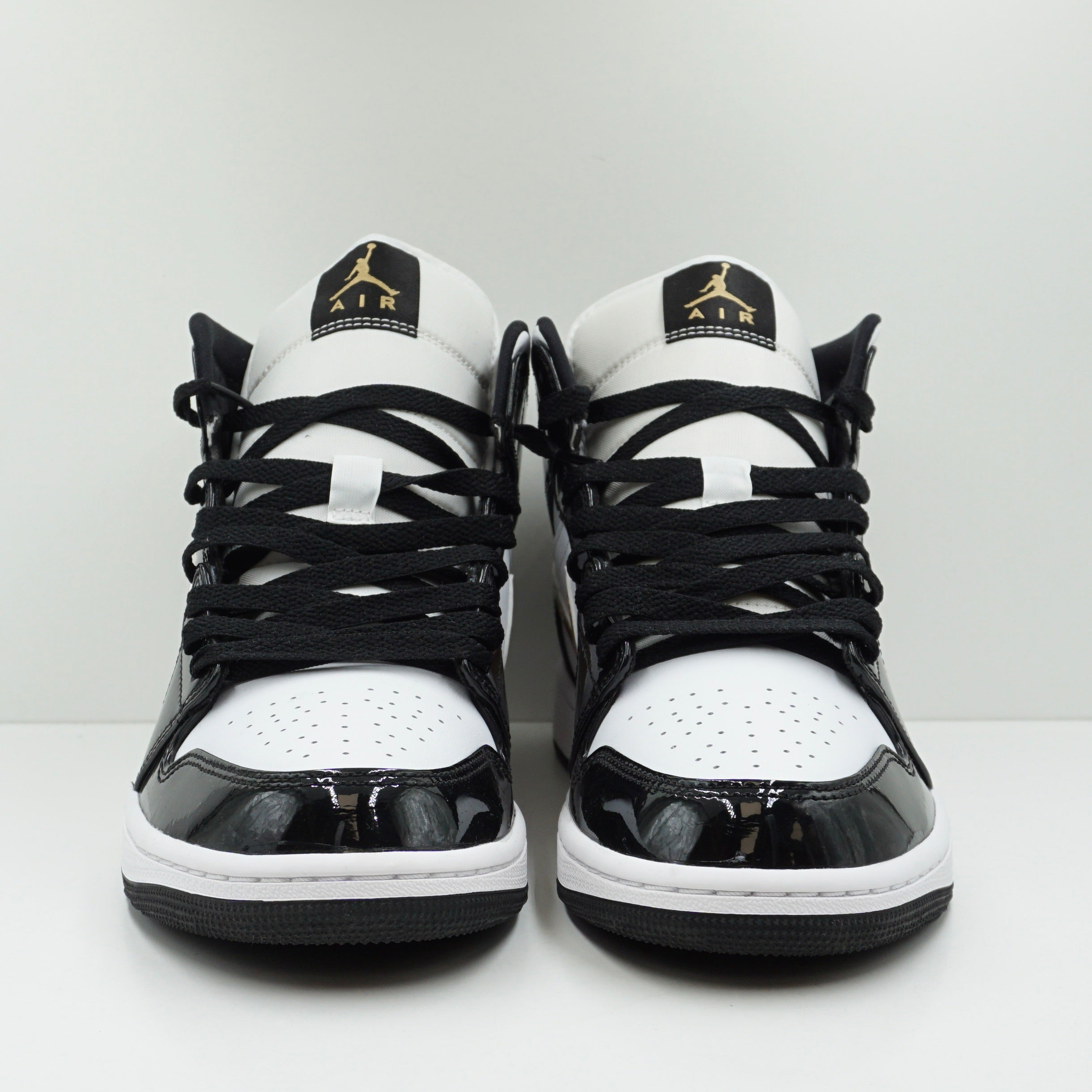 Jordan 1 Mid Patent Black White Gold