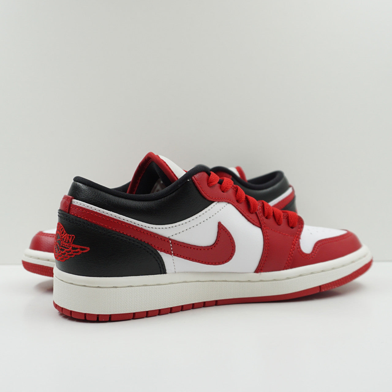 Jordan 1 Low Reverse Black Toe (W)