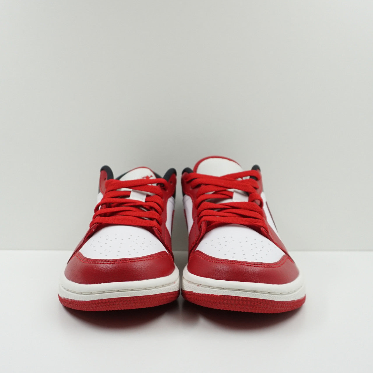 Jordan 1 Low Reverse Black Toe (W)