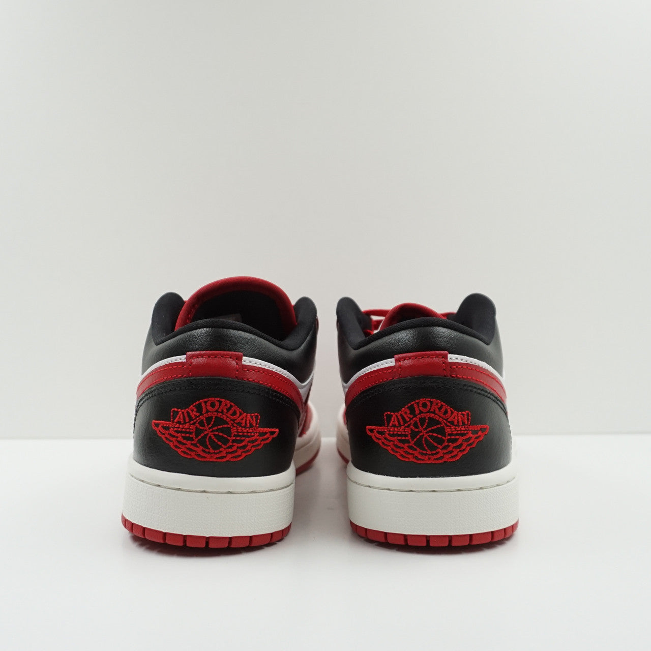 Jordan 1 Low Reverse Black Toe (W)