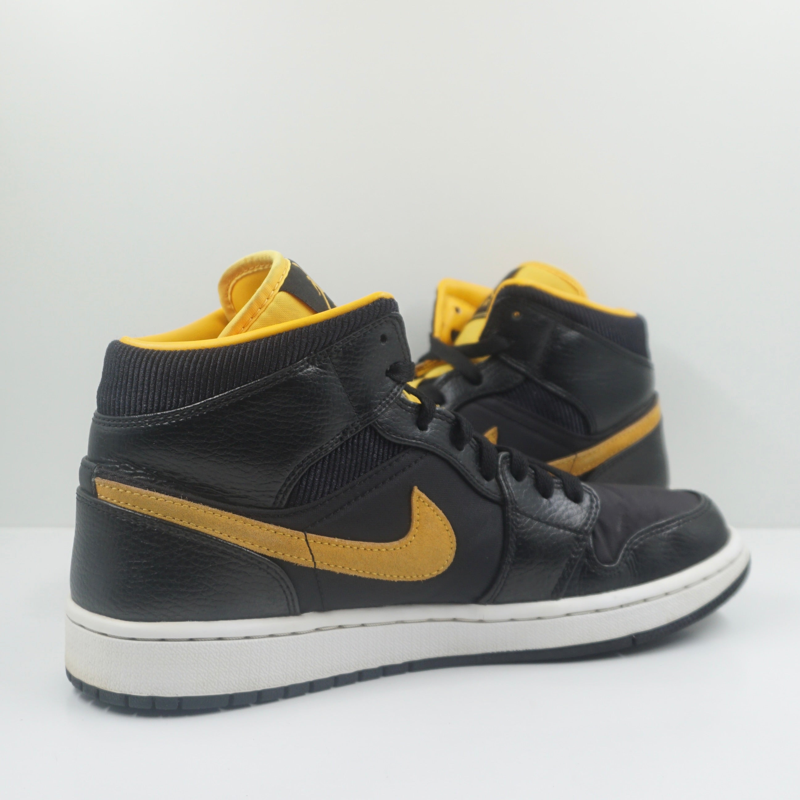 Jordan 1 Mid Black University Gold