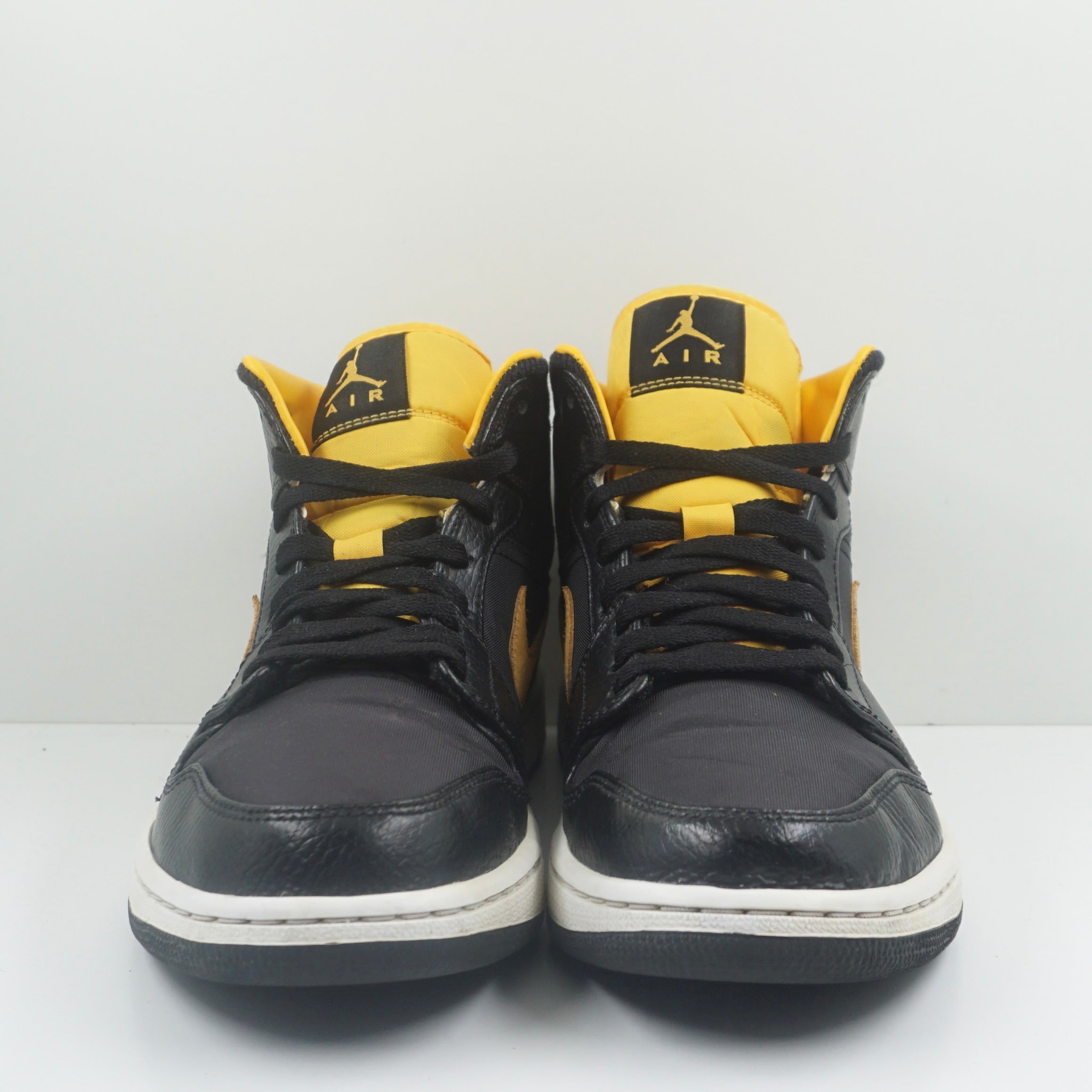 Jordan 1 Mid Black University Gold