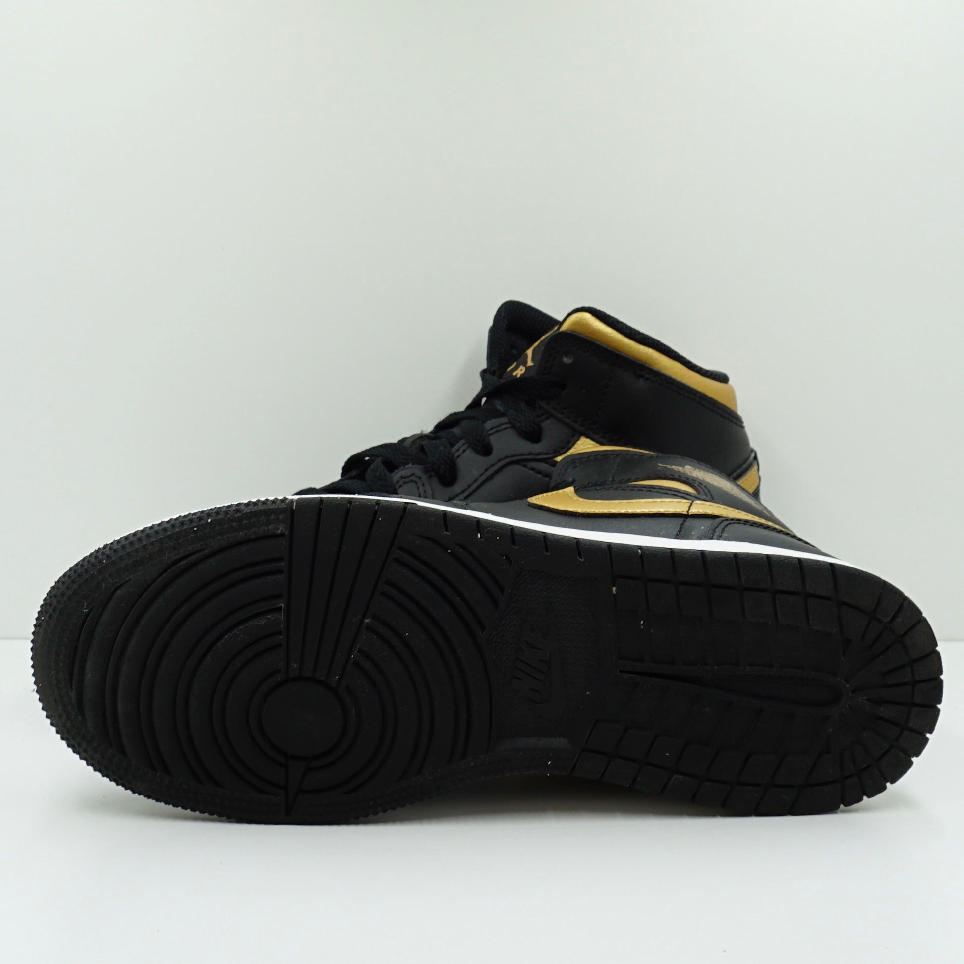 Jordan 1 Mid Black Metallic Gold Swoosh (GS)