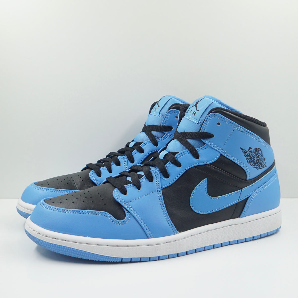 Jordan 1 Mid University Blue Black