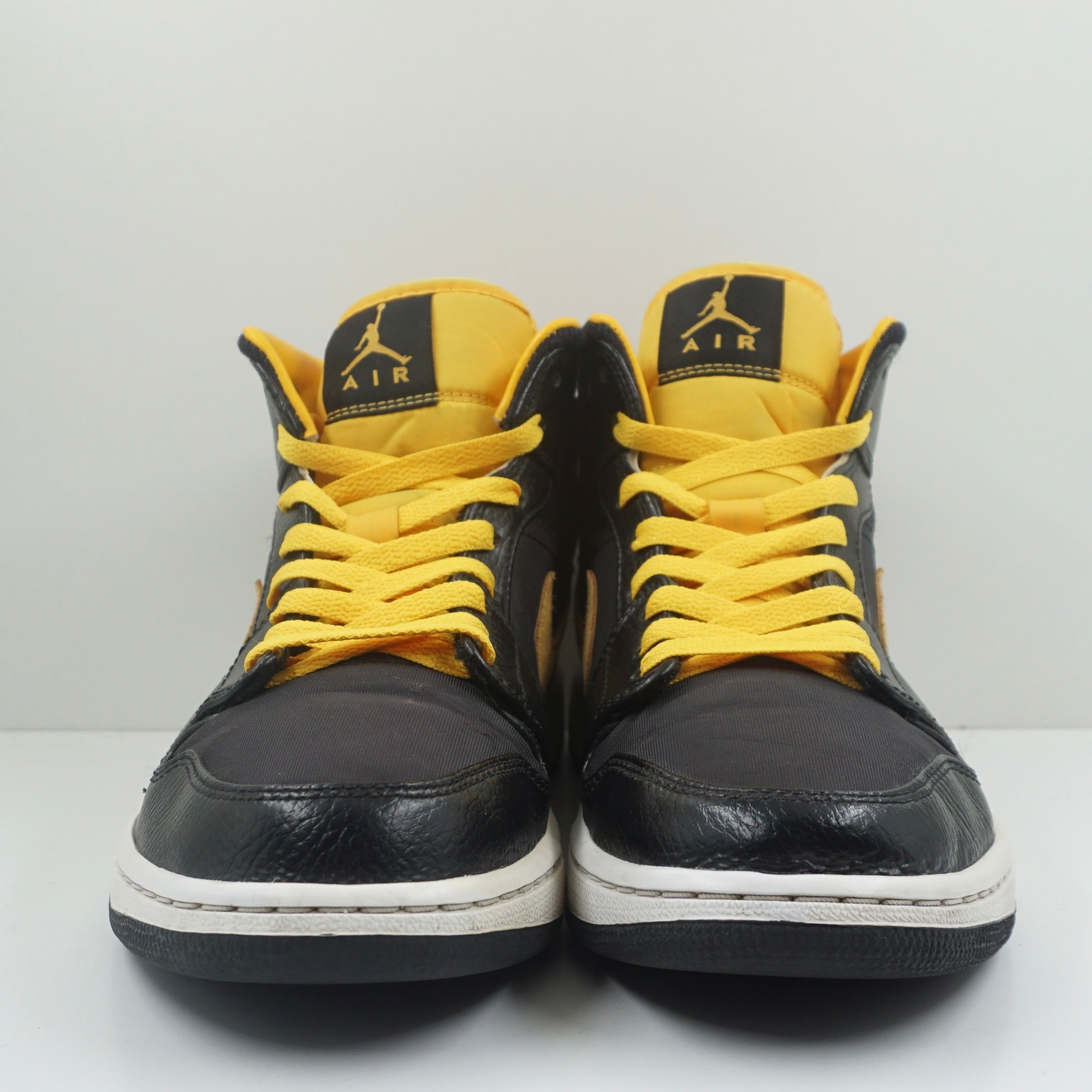 Jordan 1 Mid Black University Gold