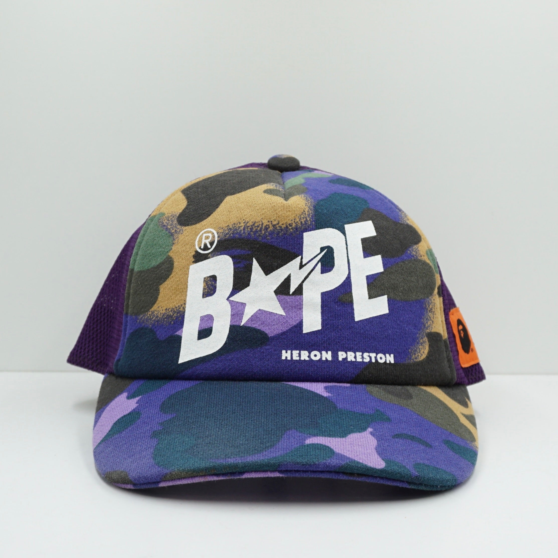 Bape x Heron Preston SS22 Mix 1st Camo Purple Mesh Snapback Cap