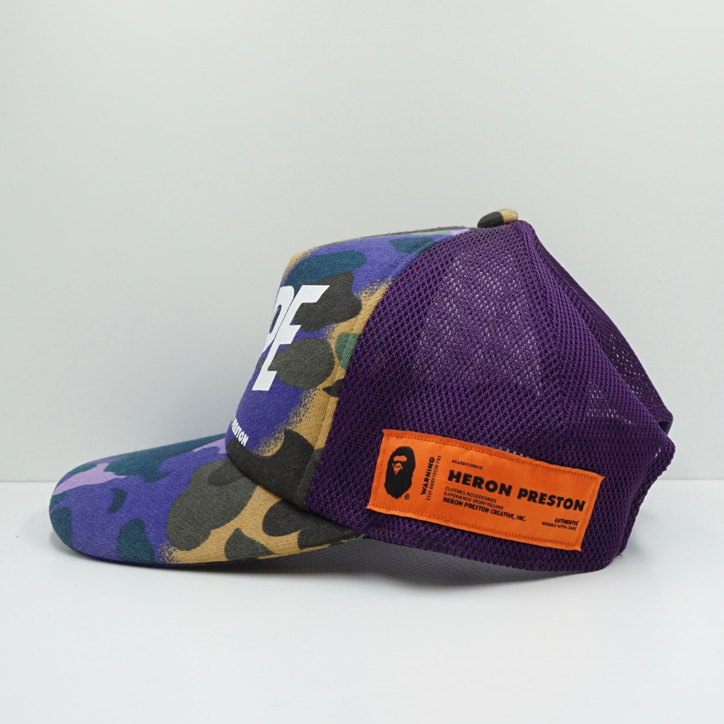 Bape x Heron Preston SS22 Mix 1st Camo Purple Mesh Snapback Cap