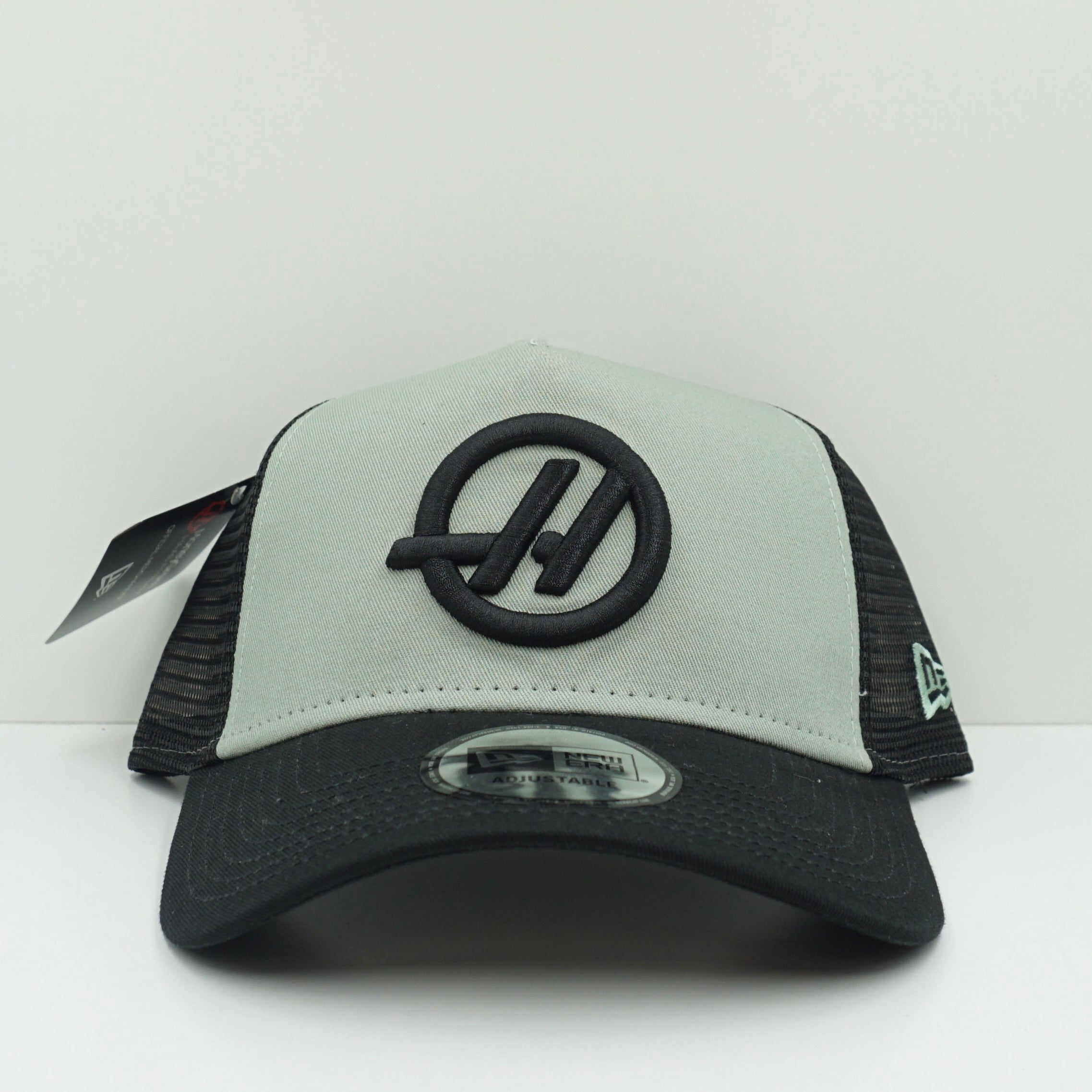 New Era Haas Green Black Trucker Snapback Cap