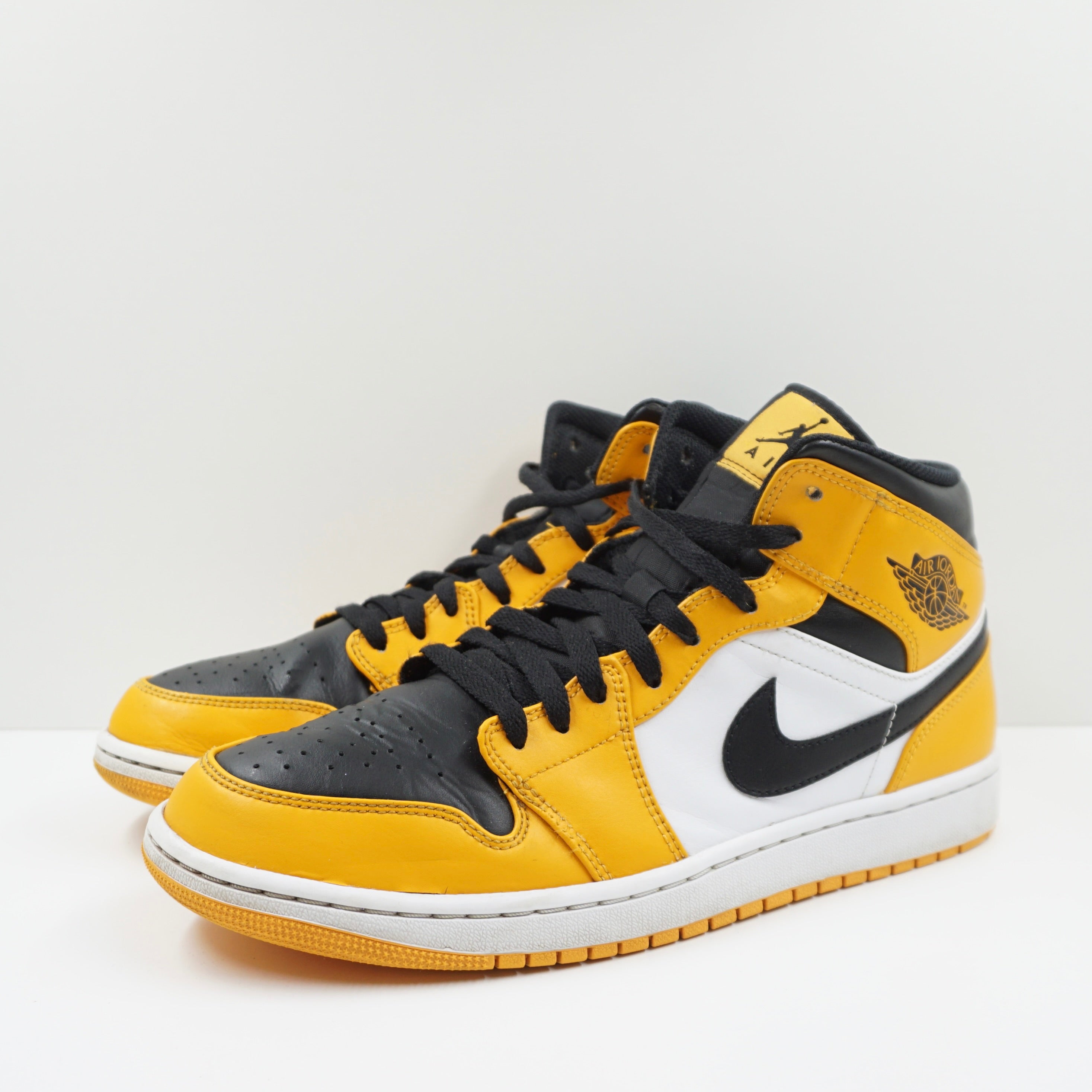 Jordan 1 Mid Taxi