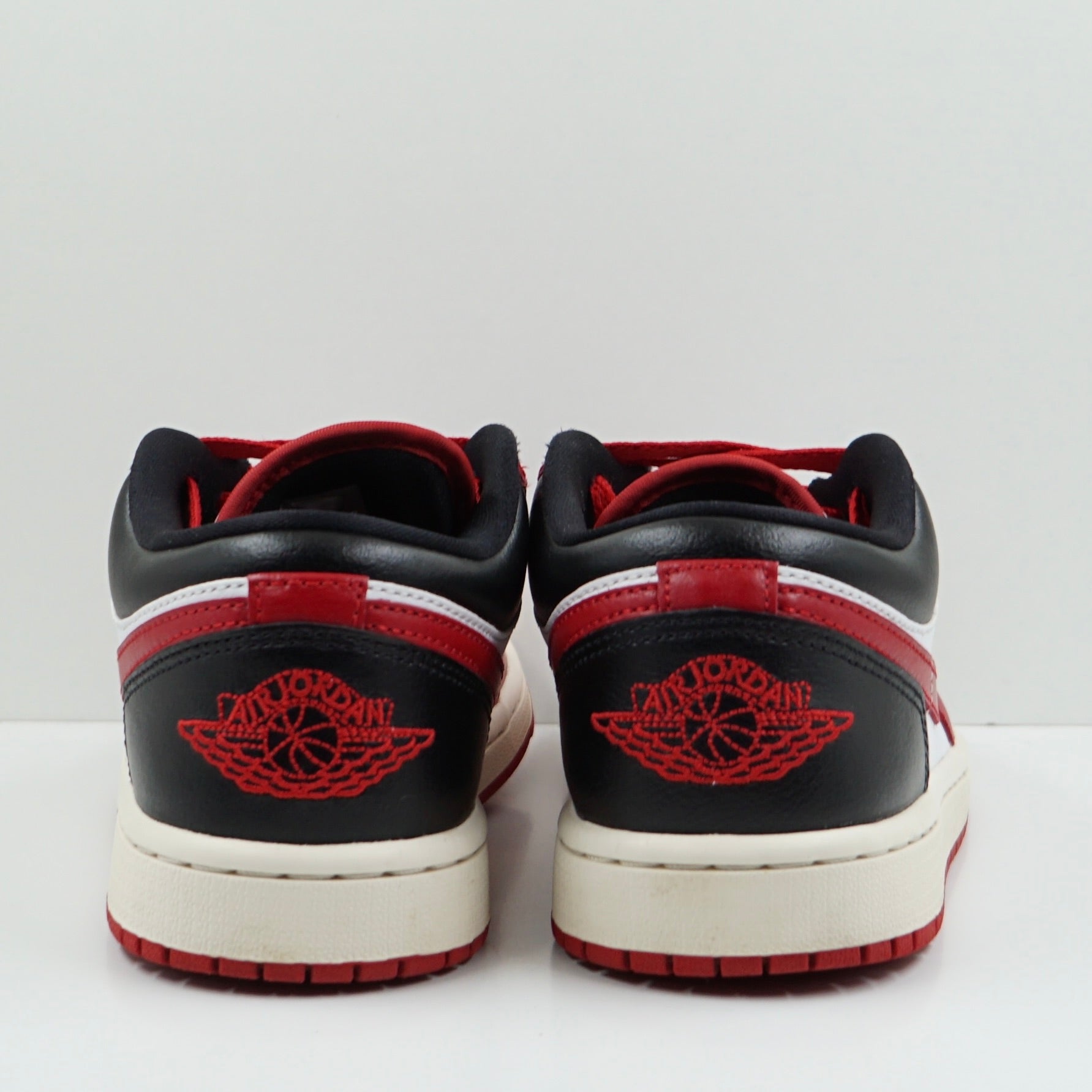 Jordan 1 Low Reverse Black Toe (W)