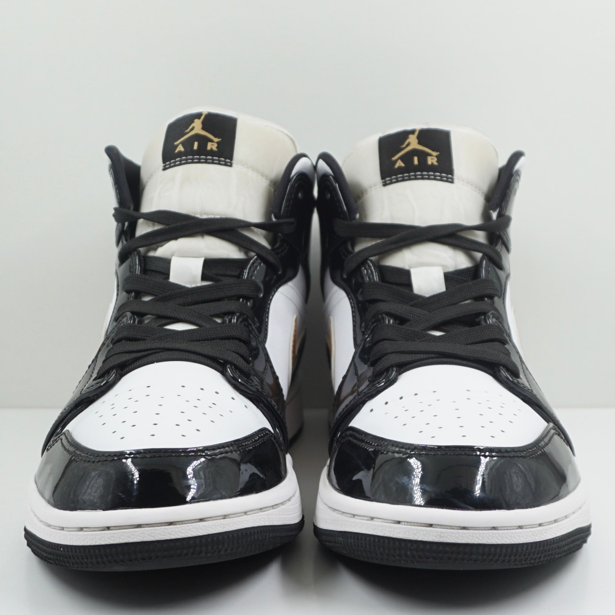 Jordan 1 Mid Patent Black White Gold