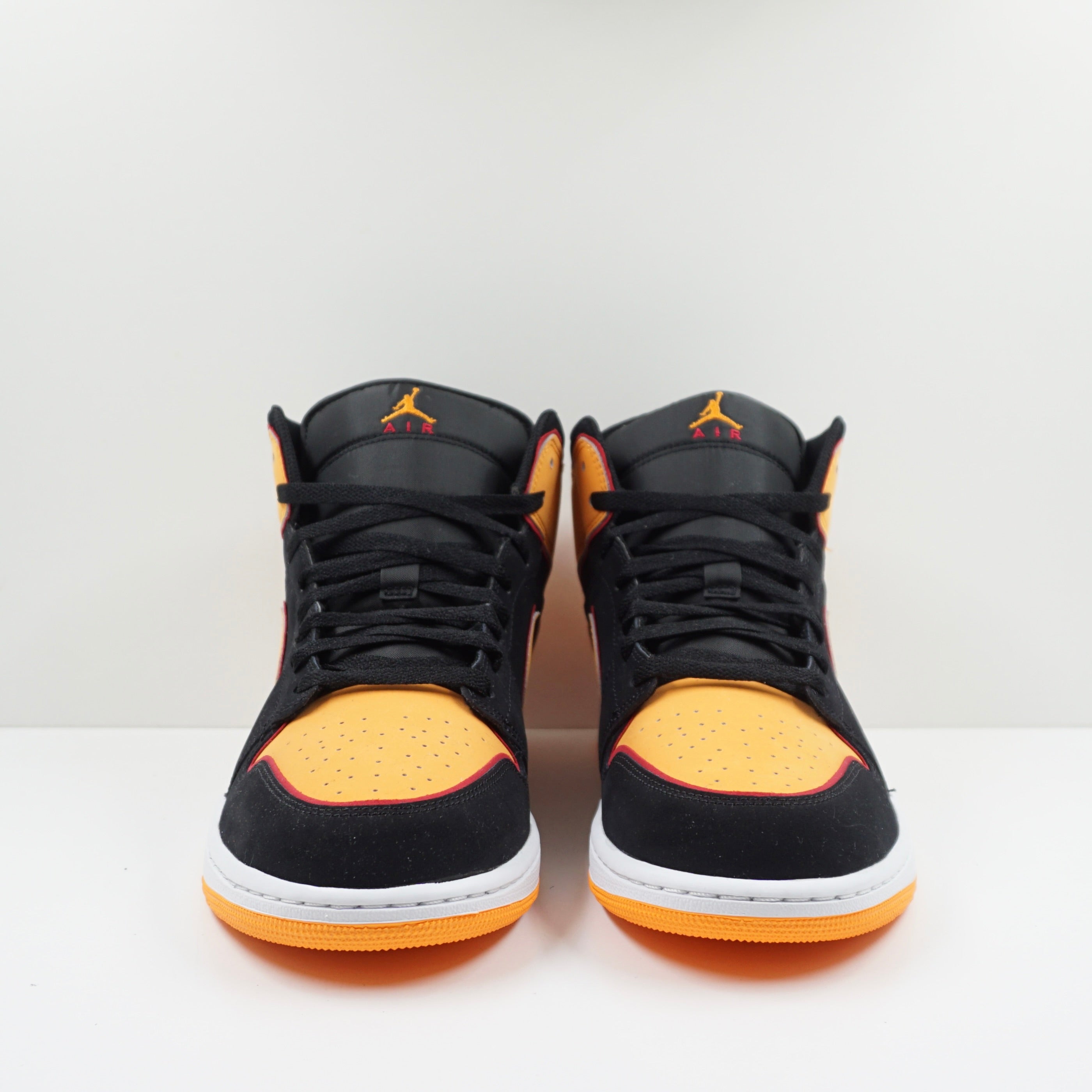Jordan 1 Mid Fat Tongue Black Orange