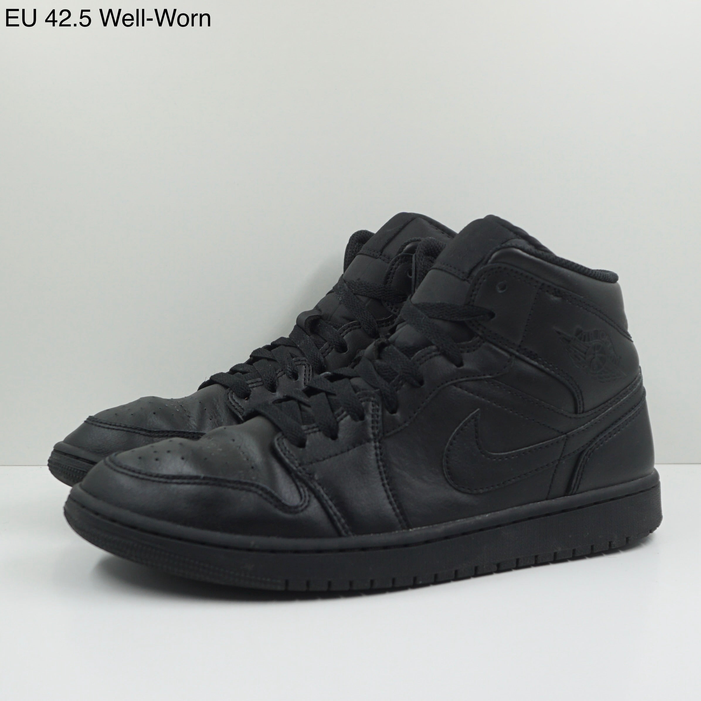 Jordan 1 Mid Triple Black