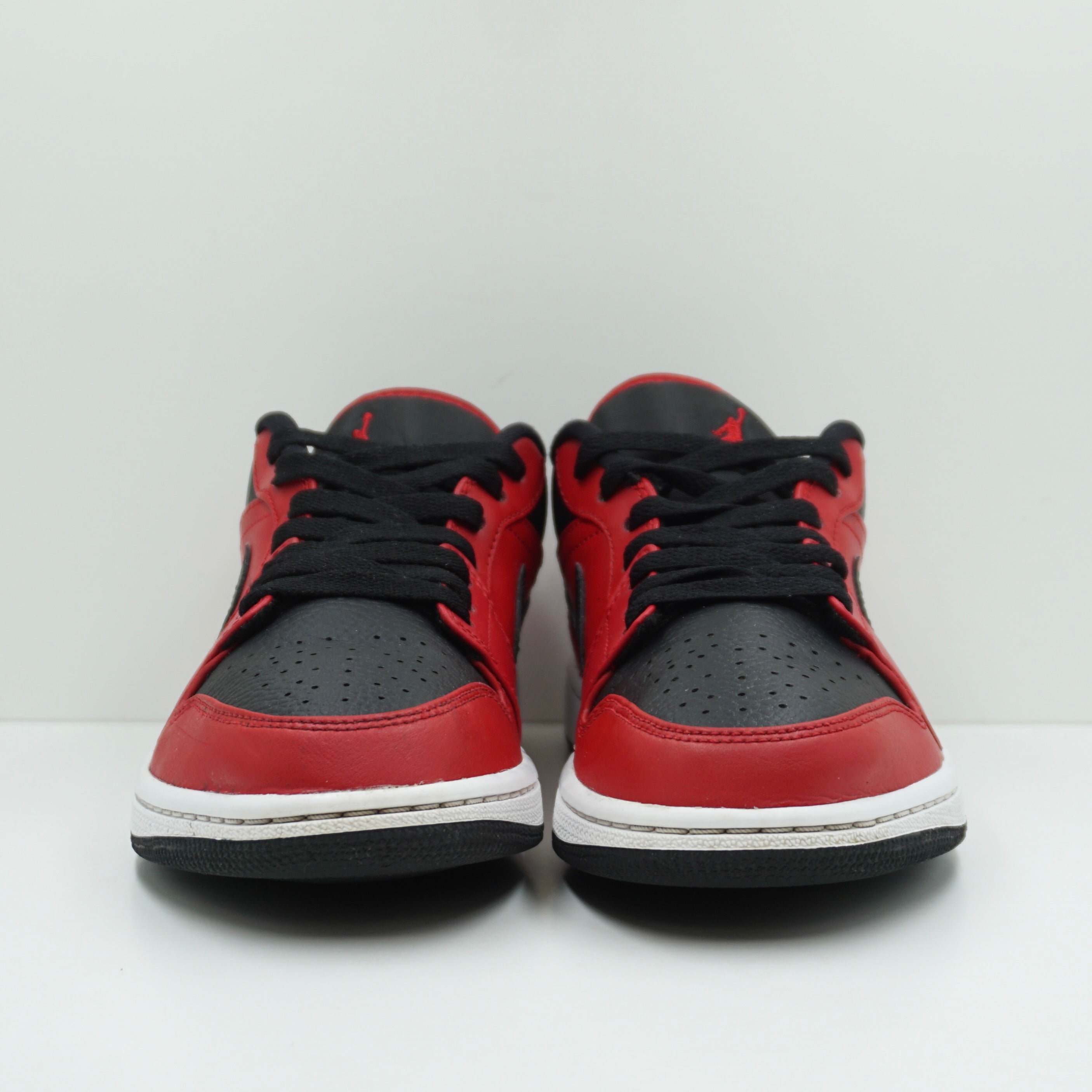 Jordan 1 Low Reverse Bred Pebbled Swoosh
