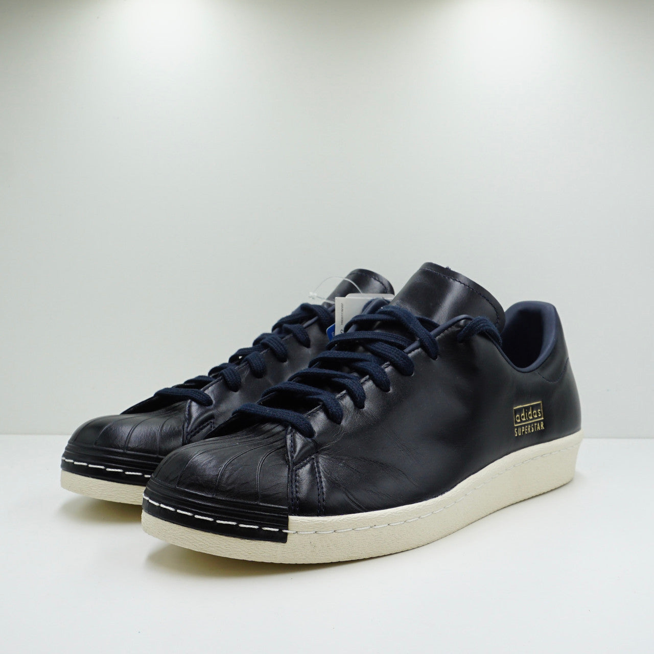 How to clean adidas superstar black best sale