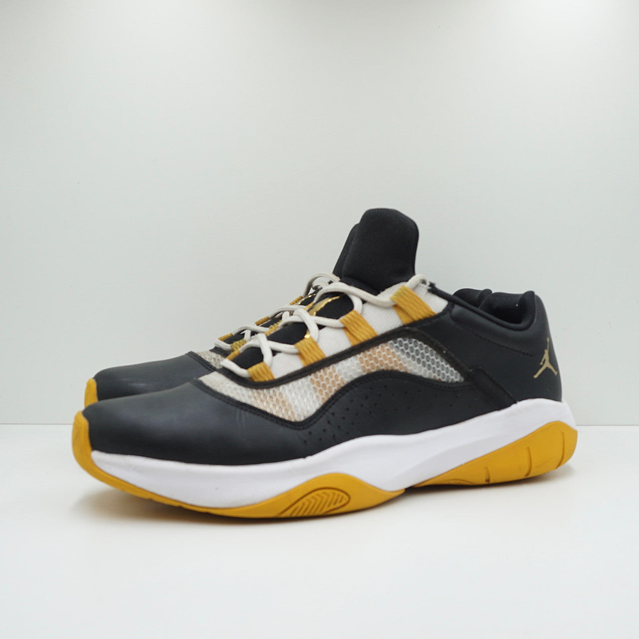 Jordan 11 CMFT Low Black Gold White